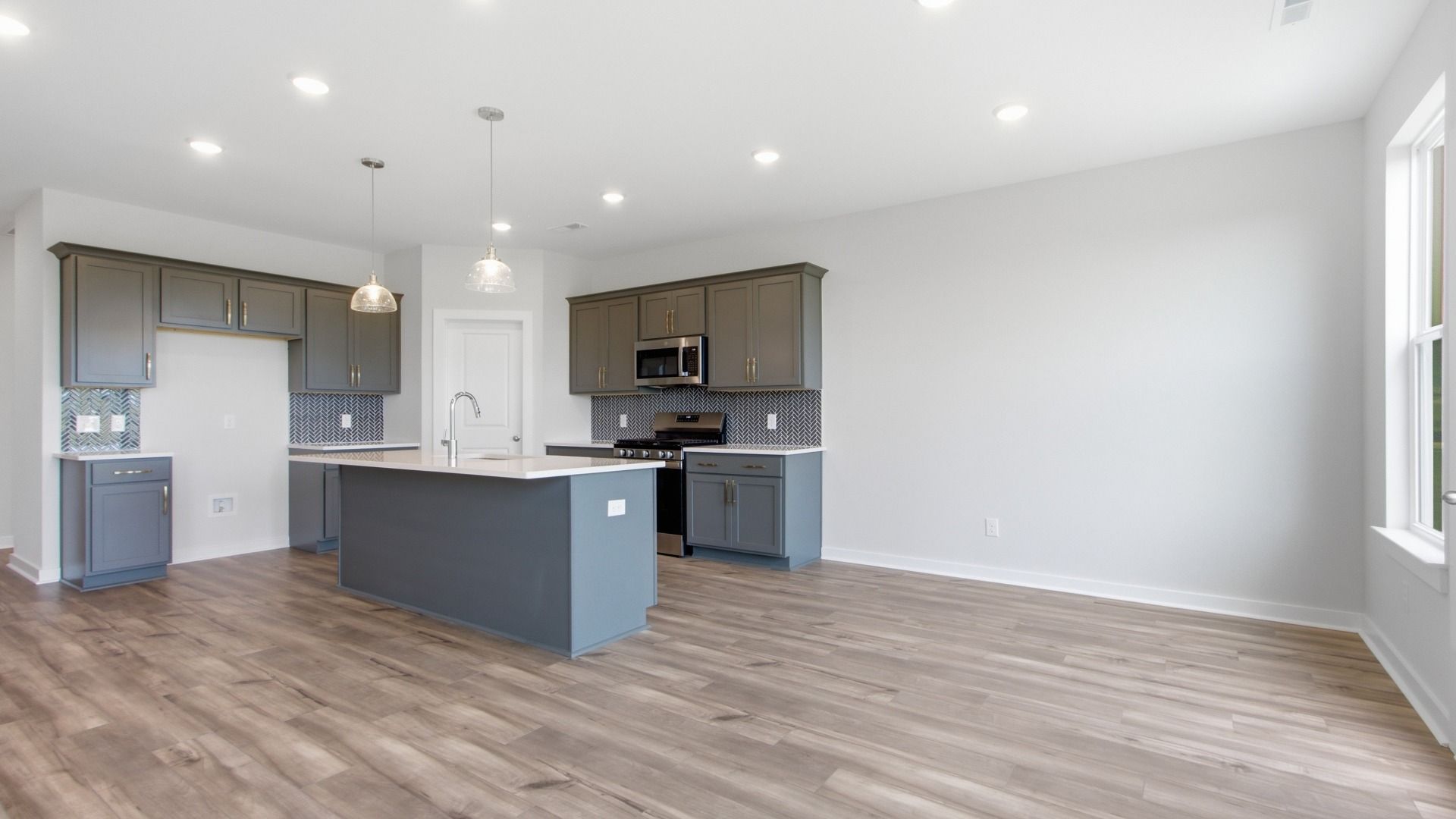 Room for entertaining and hosting space alongside kitchen