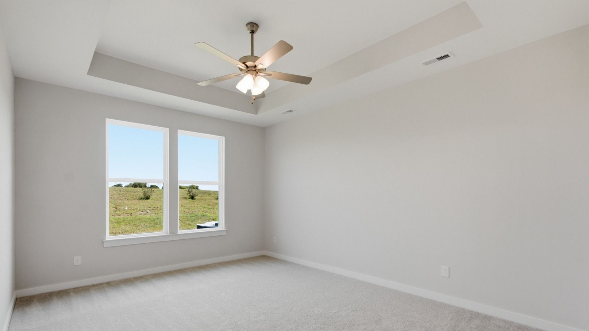 Primary bedroom on first floor with open design