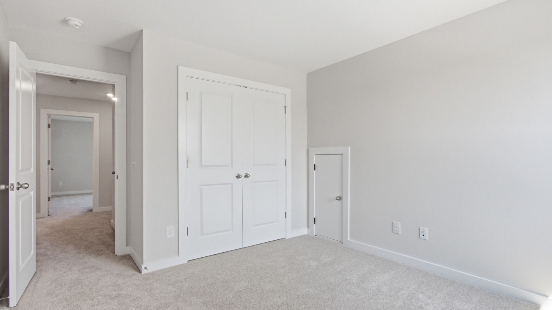 Double-door closet for secondary bedroom