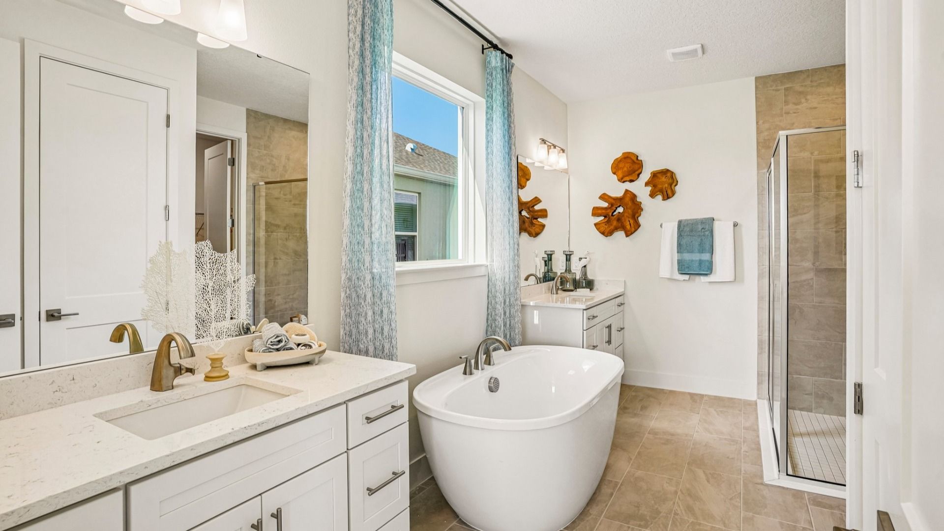 Oleander Primary Suite En Suite Bath by DRB Homes in Ardisia Park in New Smyrna Beach, FL