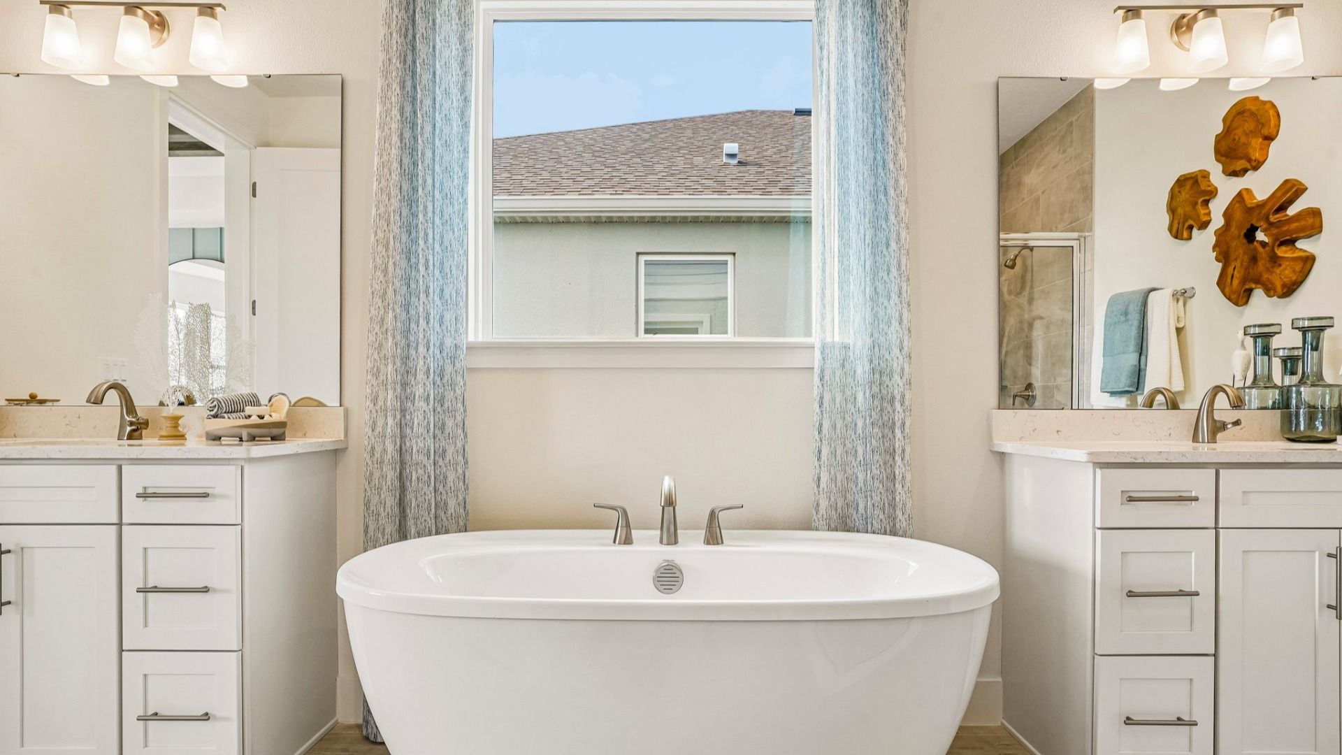 Oleander Primary Suite En Suite Bath by DRB Homes in Ardisia Park in New Smyrna Beach, FL
