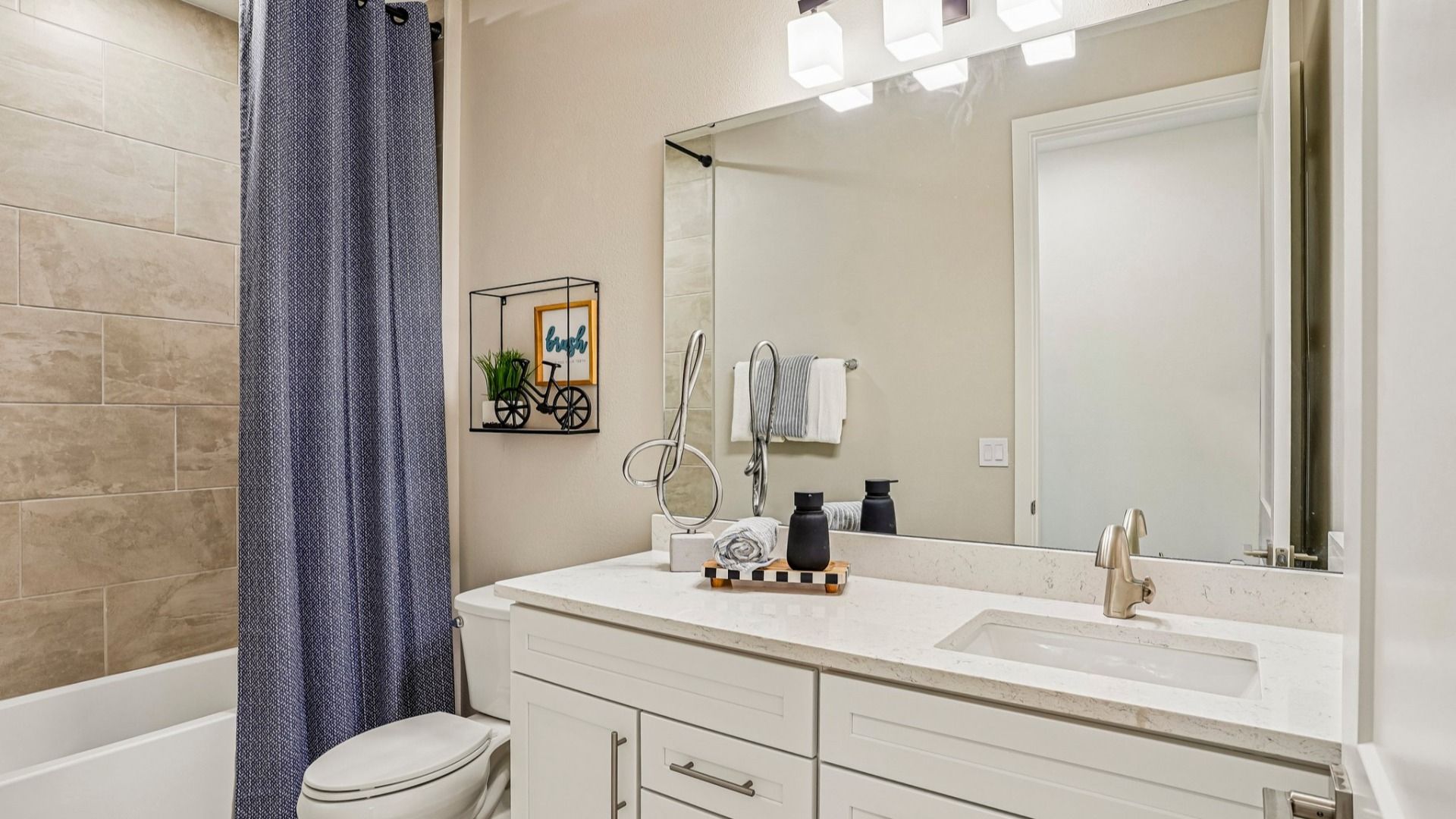 Oleander First Floor Secondary Bathroom by DRB Homes in Ardisia Park in New Smyrna Beach, FL