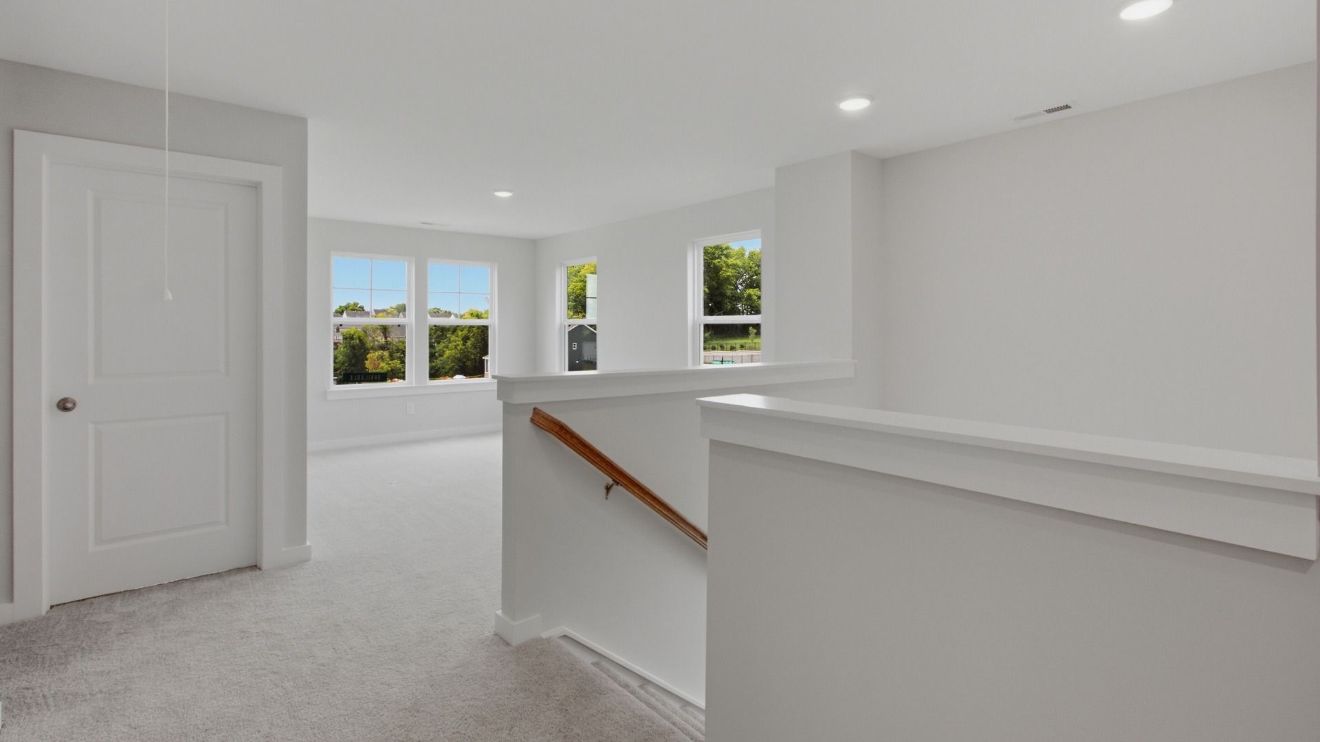 Versatile upstairs living area next to staircase