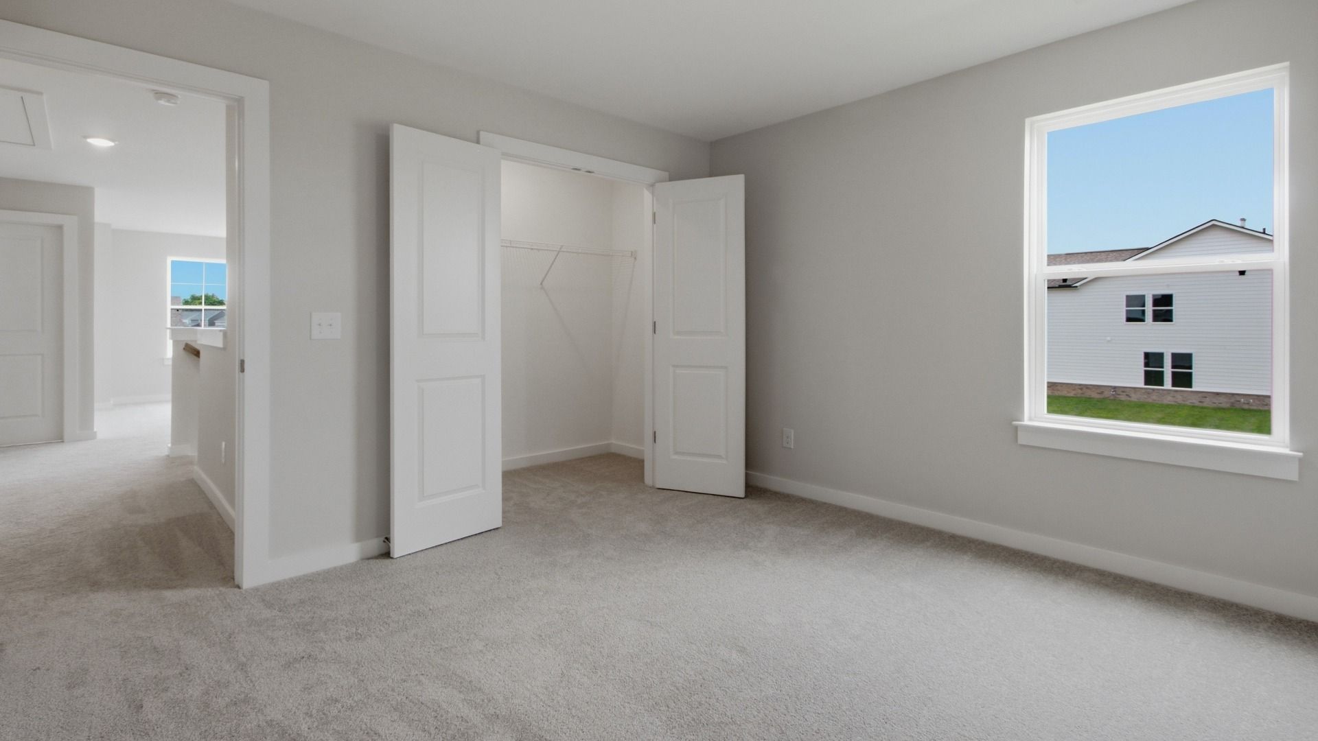 Secondary room with spacious closet next to window and room entrance