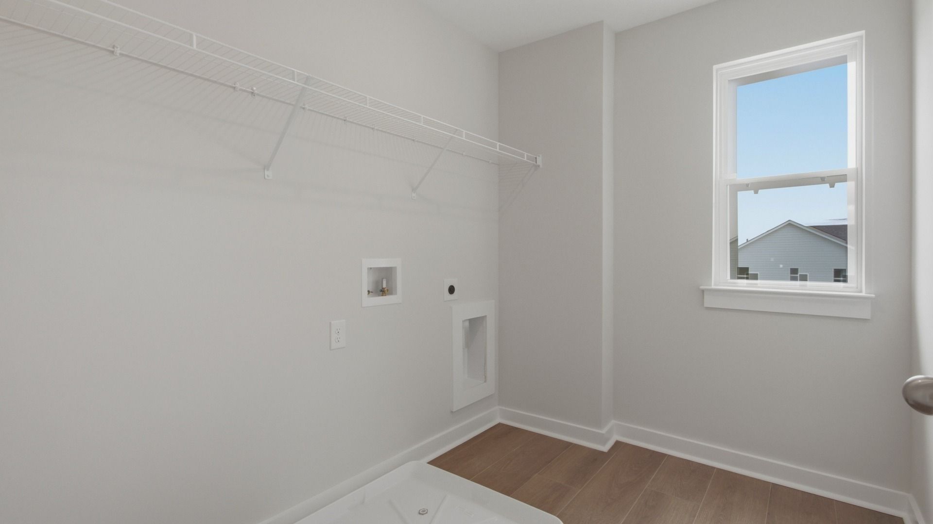 Elevated walk-in closet with window