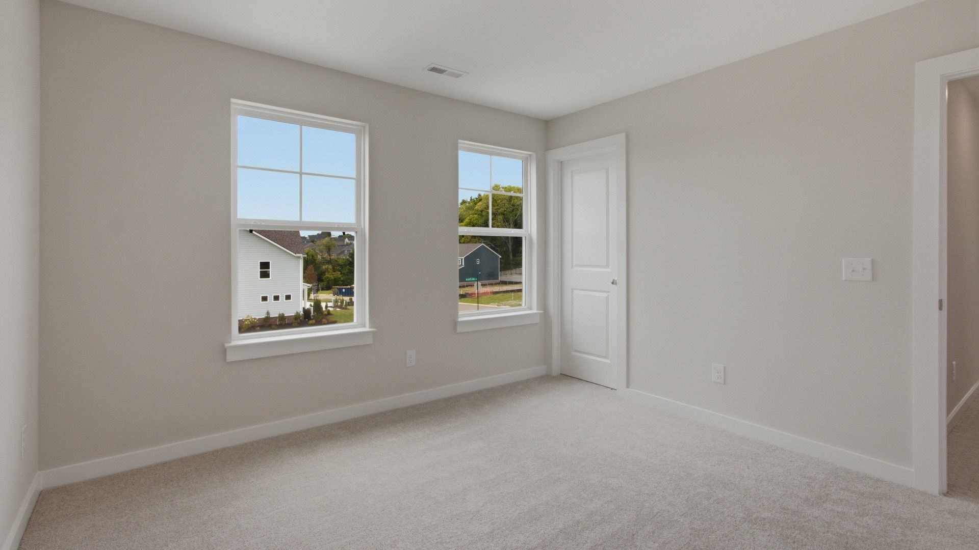Closet next to windows in spacious secondary room