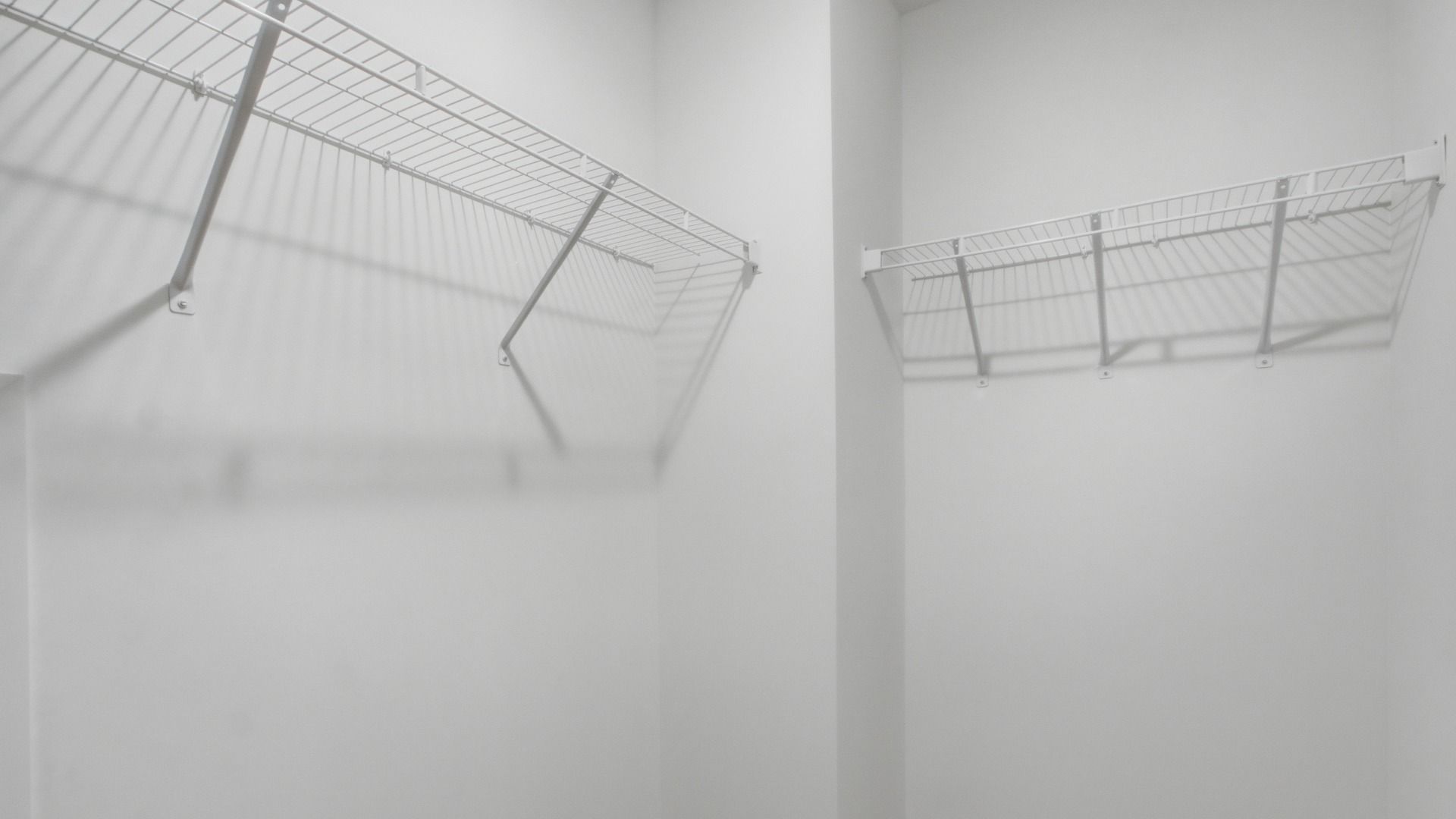 Walk-in closet with ventilated shelving