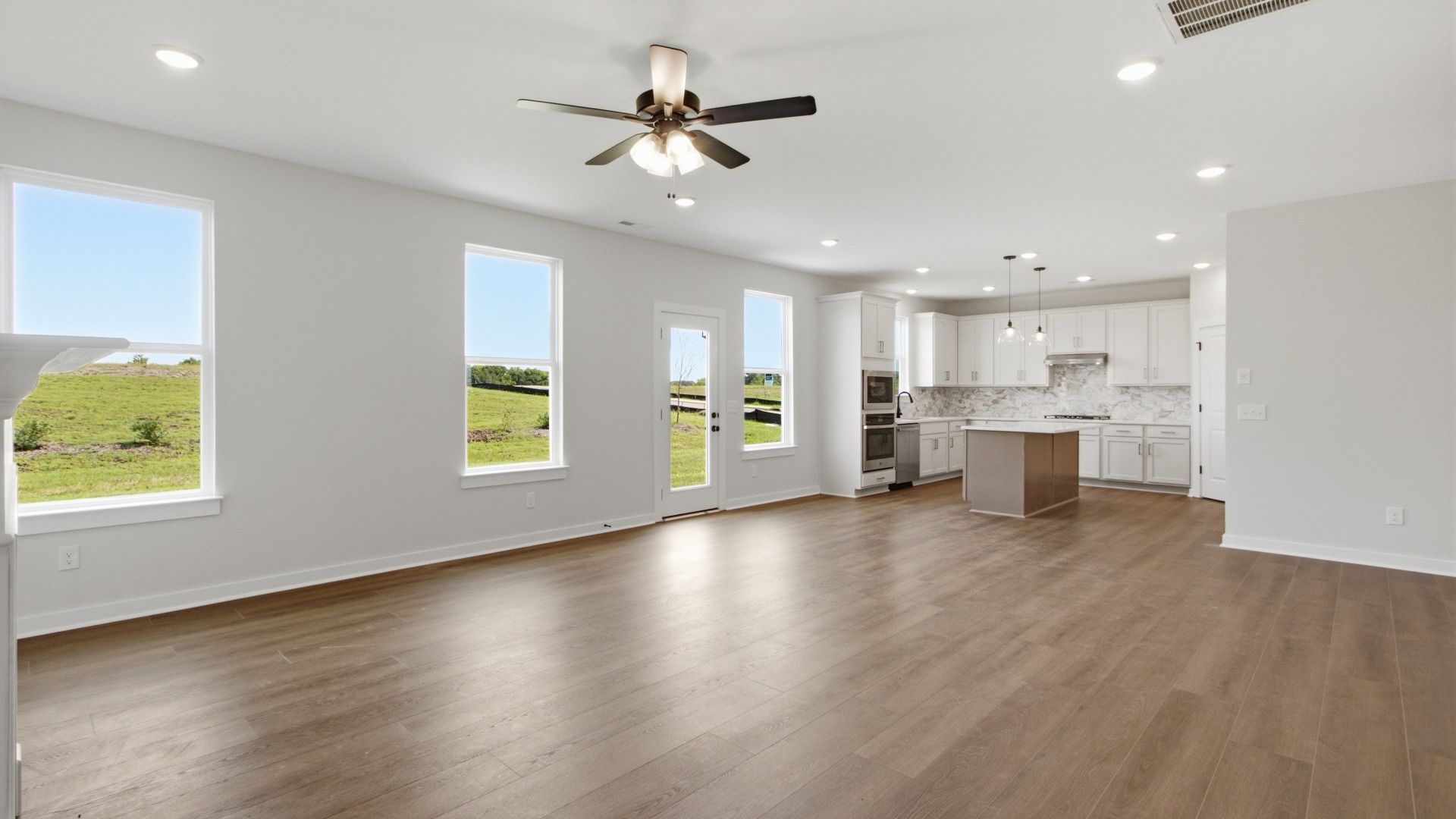 Open concept first floor with kitchen and living room with space for a dining area
