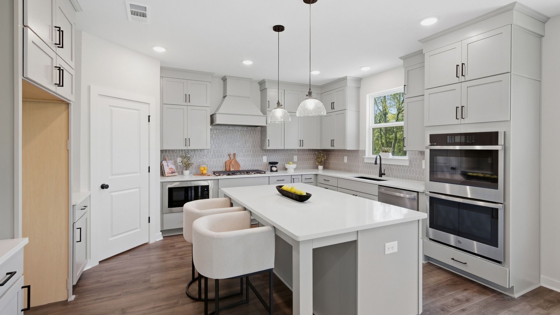 Oven across from kitchen island