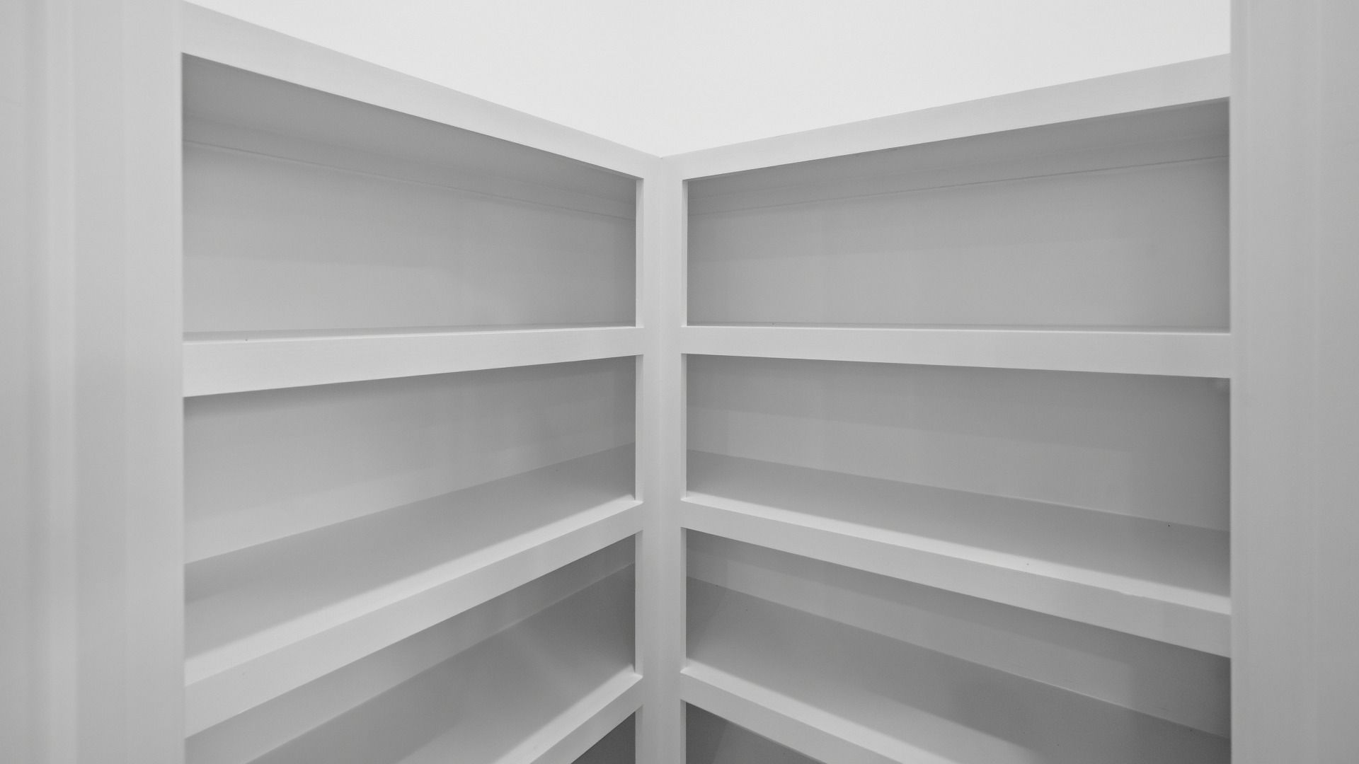Walk-in pantry with various storage options