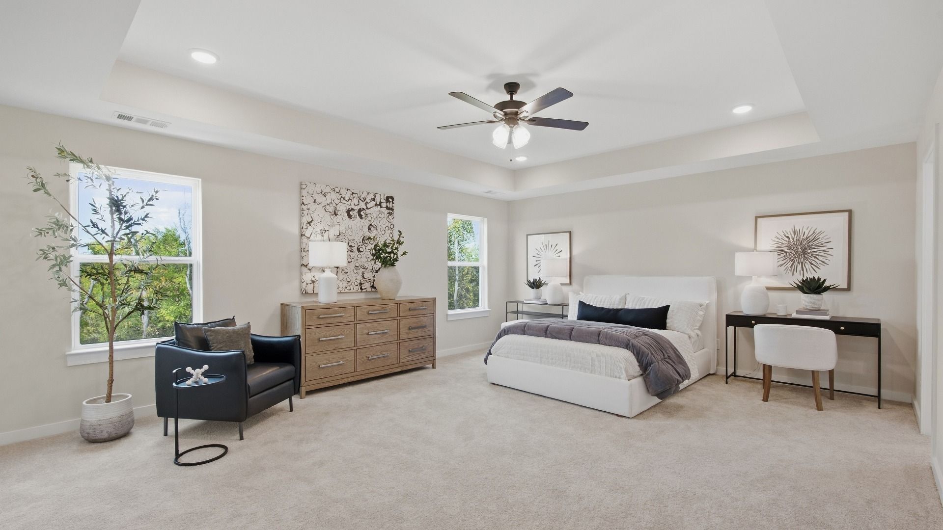 Windows to allow for natural light to enter the elevated primary bedroom