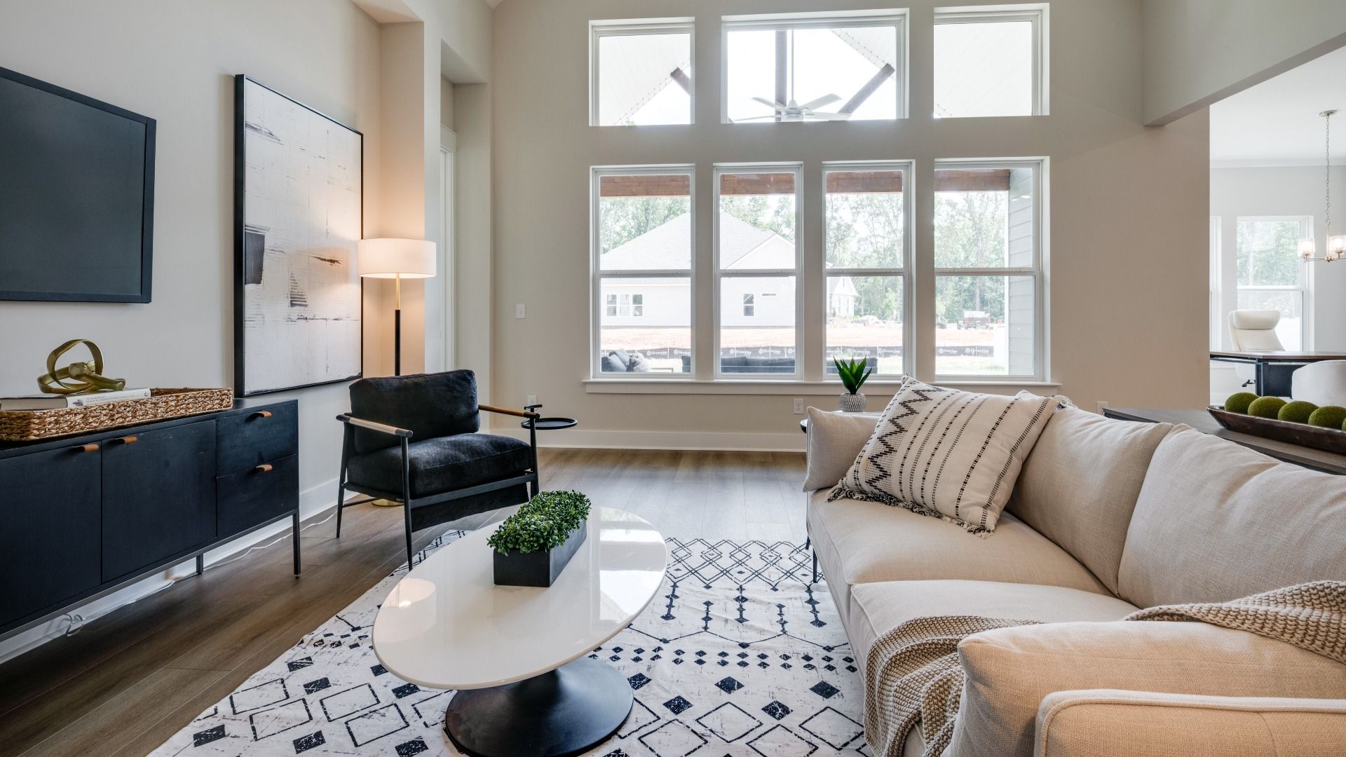 Large Windows separating indoor and outdoor living areas
