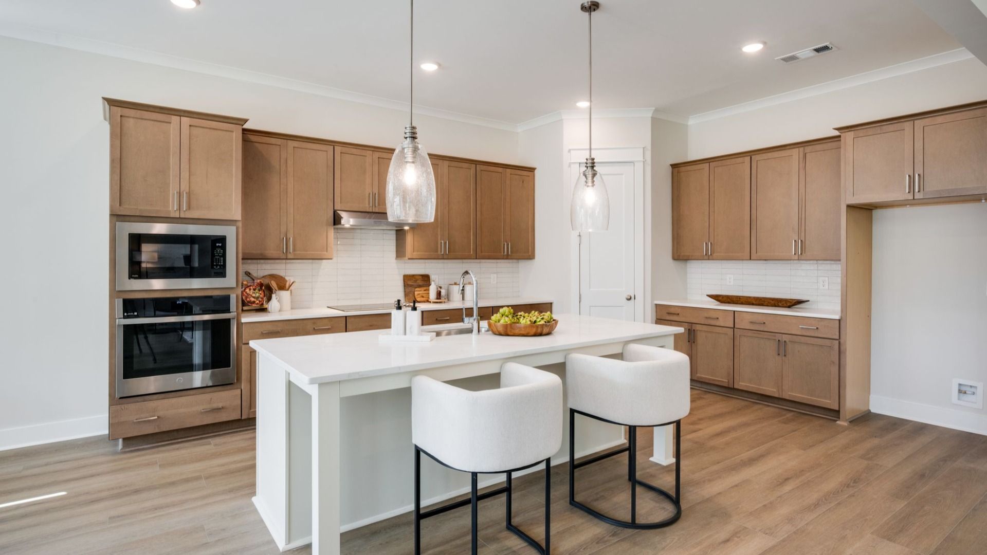 Kitchen with island and various cabinets and countertop spacing