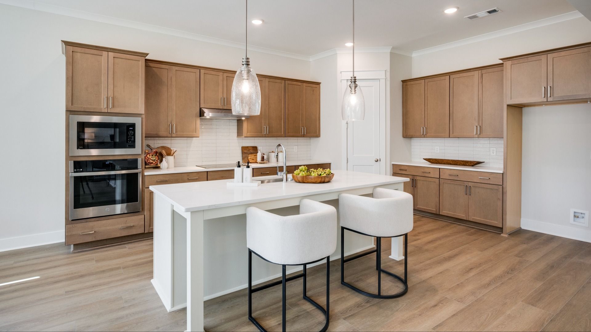 Kitchen with island and various cabinets and countertop spacing