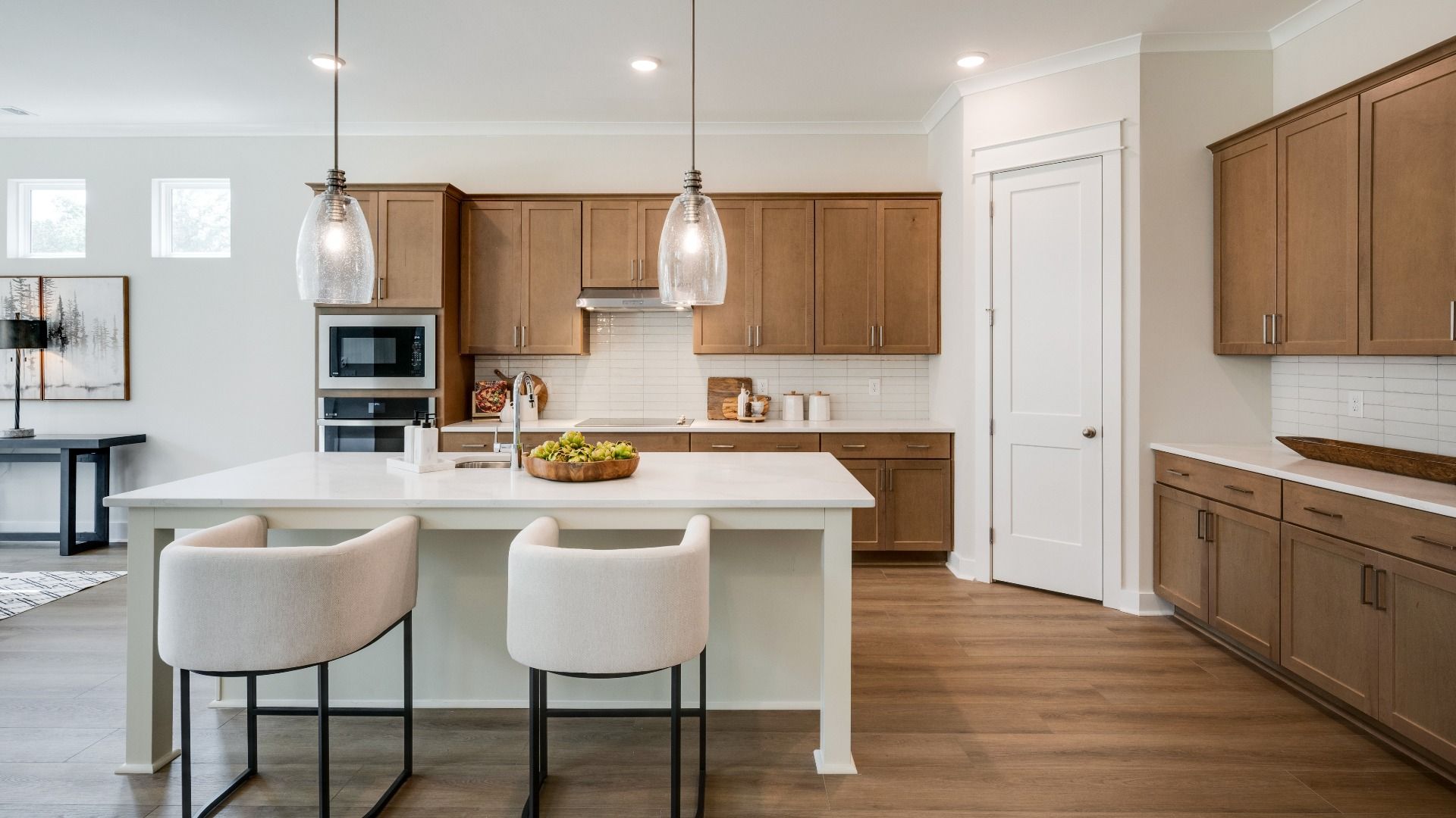 Kitchen with island and various cabinets and countertop spacing