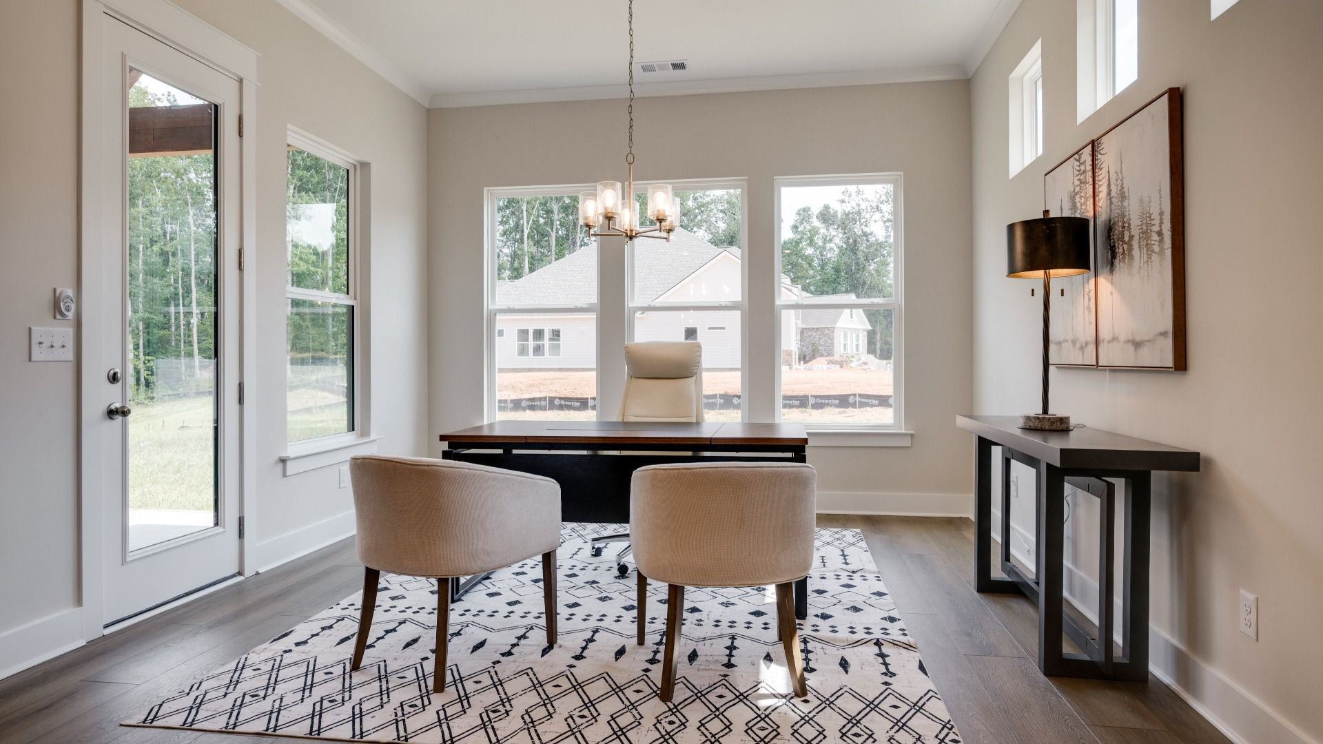 Versatile dining space right next to kitchen and backyard door