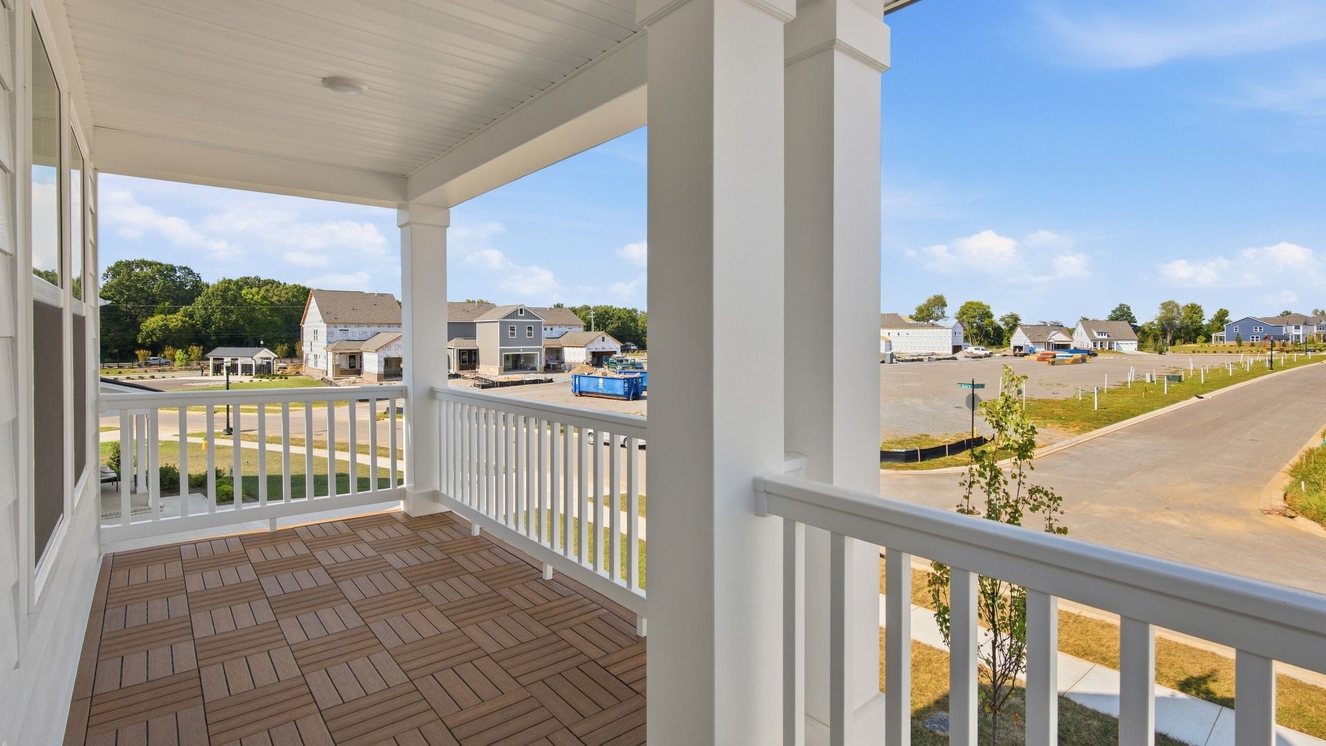 Peaceful front balcony with space and views