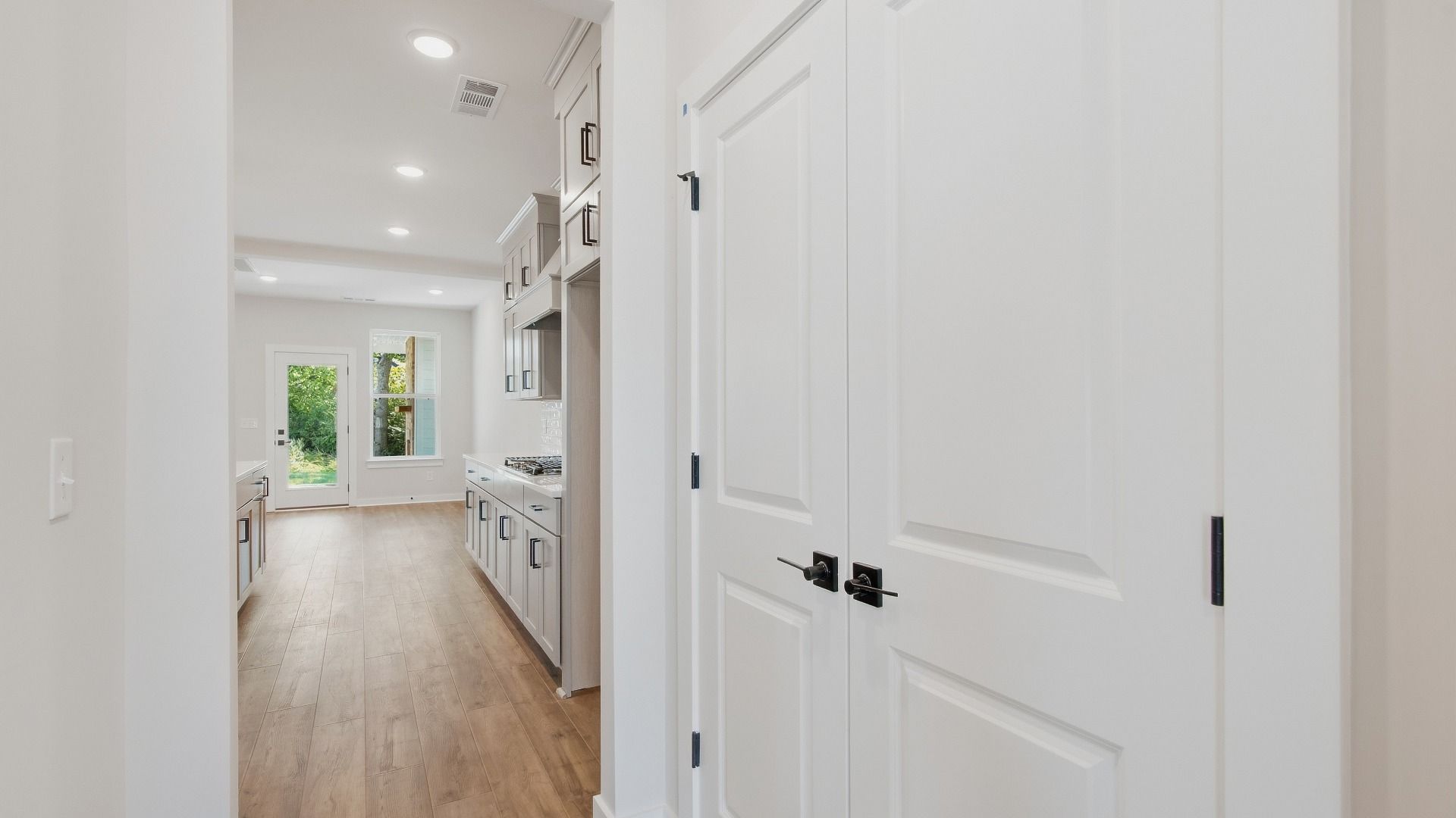 Spacious pantry next to kitchen for storage