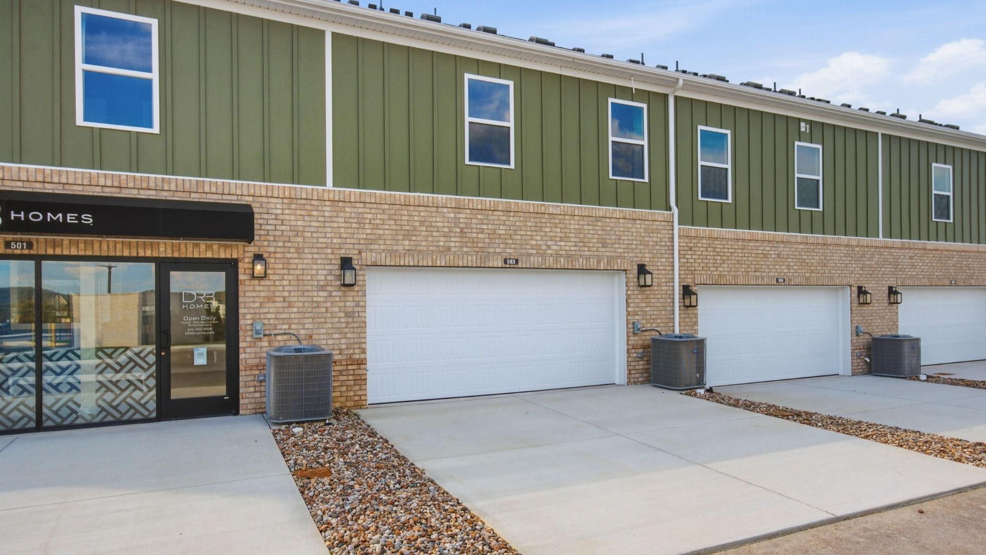 Rear exterior of home and garage