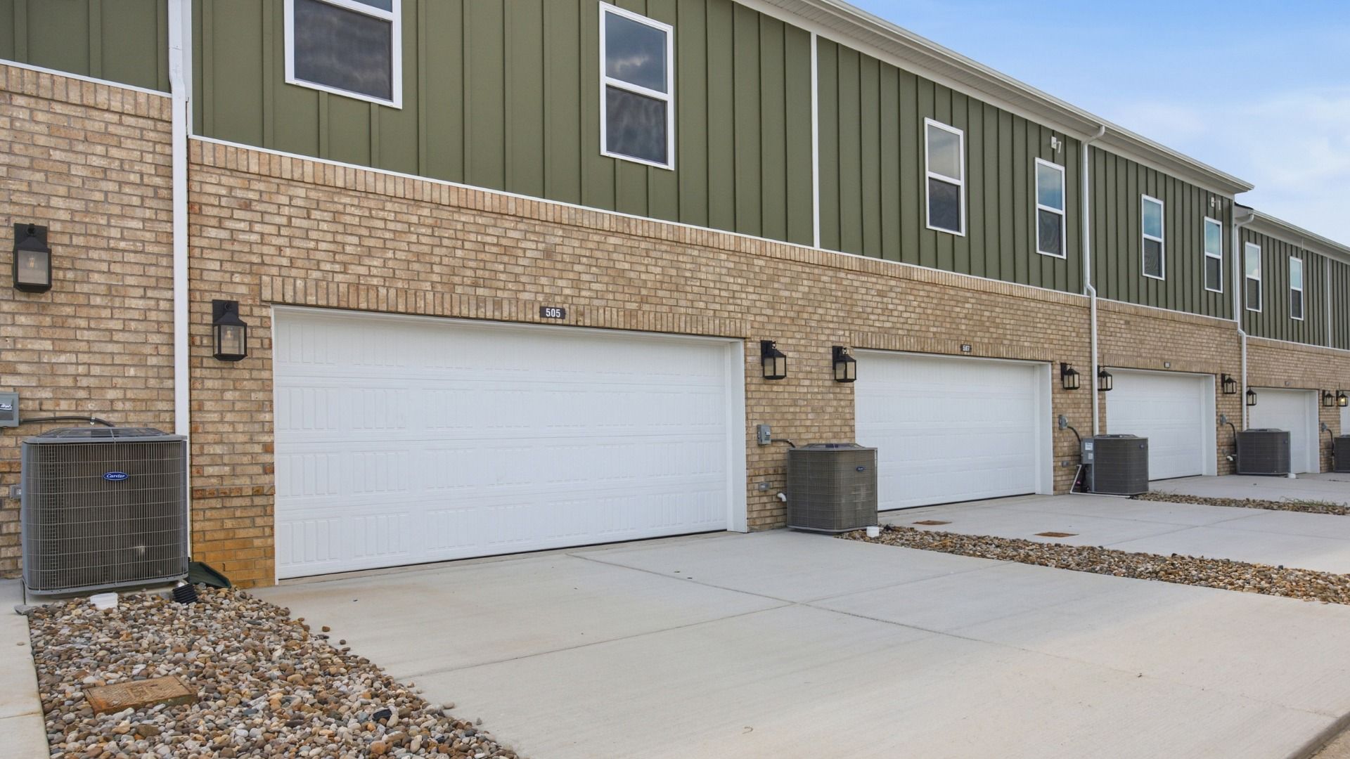 Rear exterior of home and garage