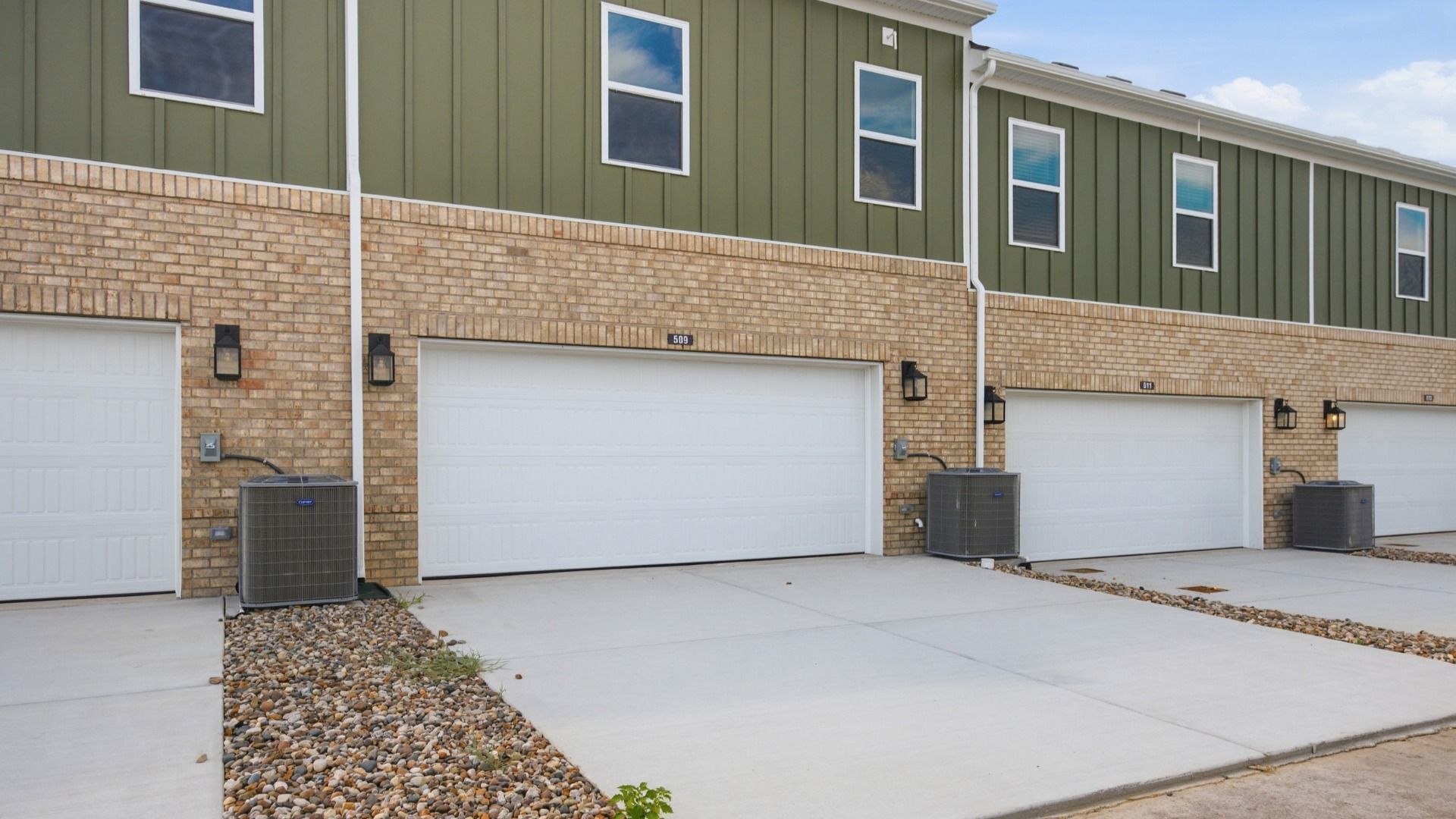 Rear exterior of home and garage