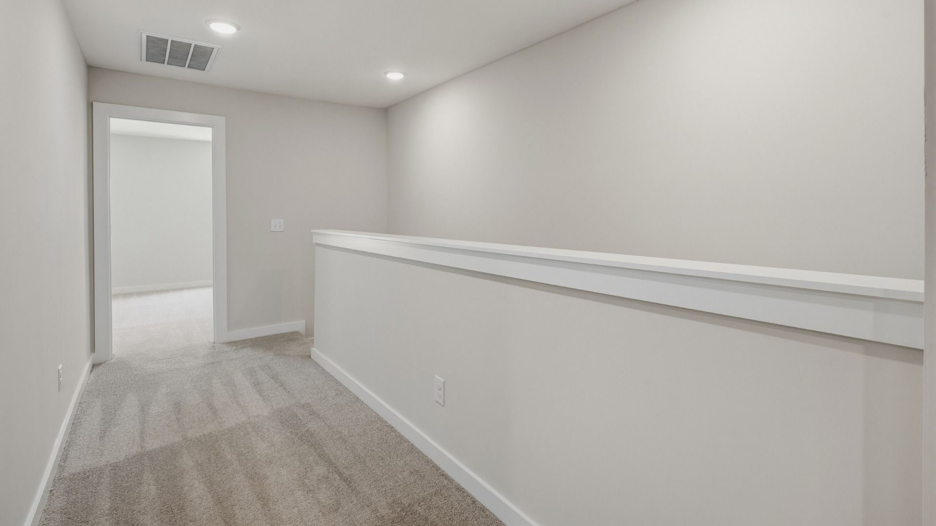 Stairway leading up to primary room
