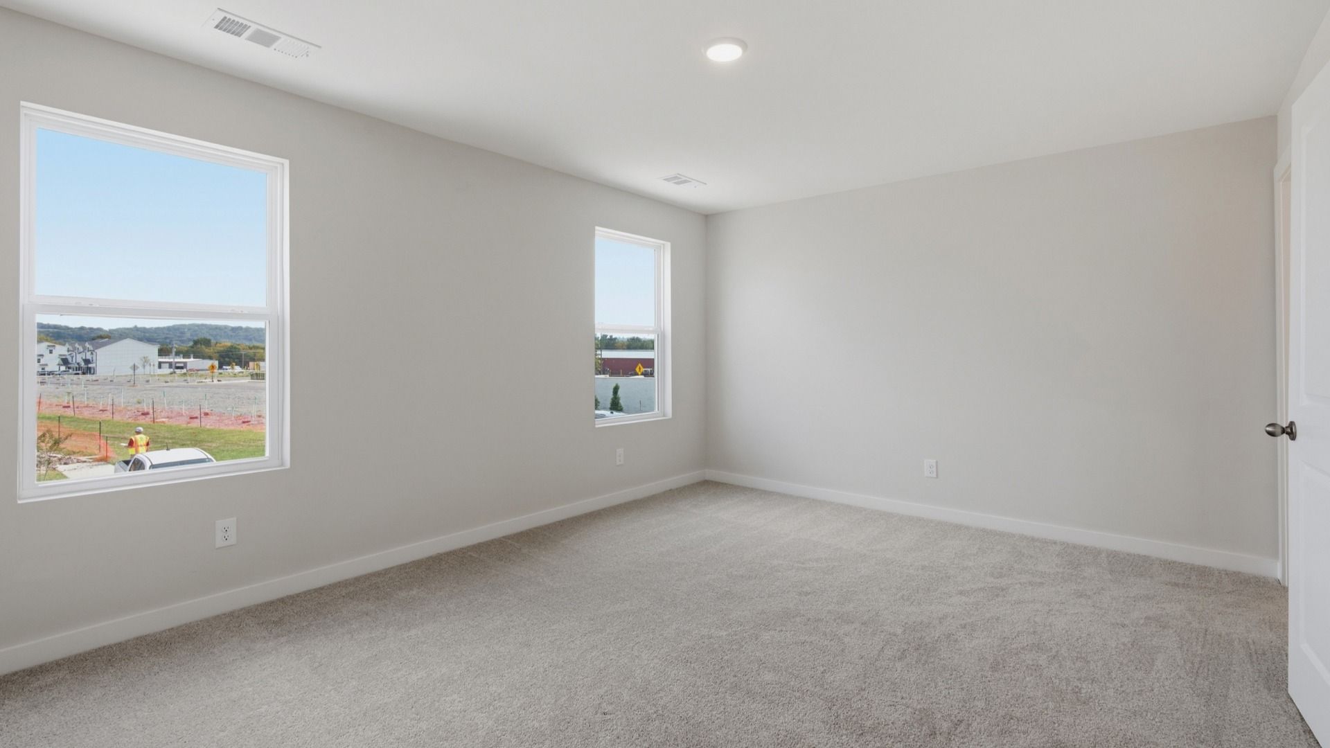 Primary room with connected bathroom and walk-in closet