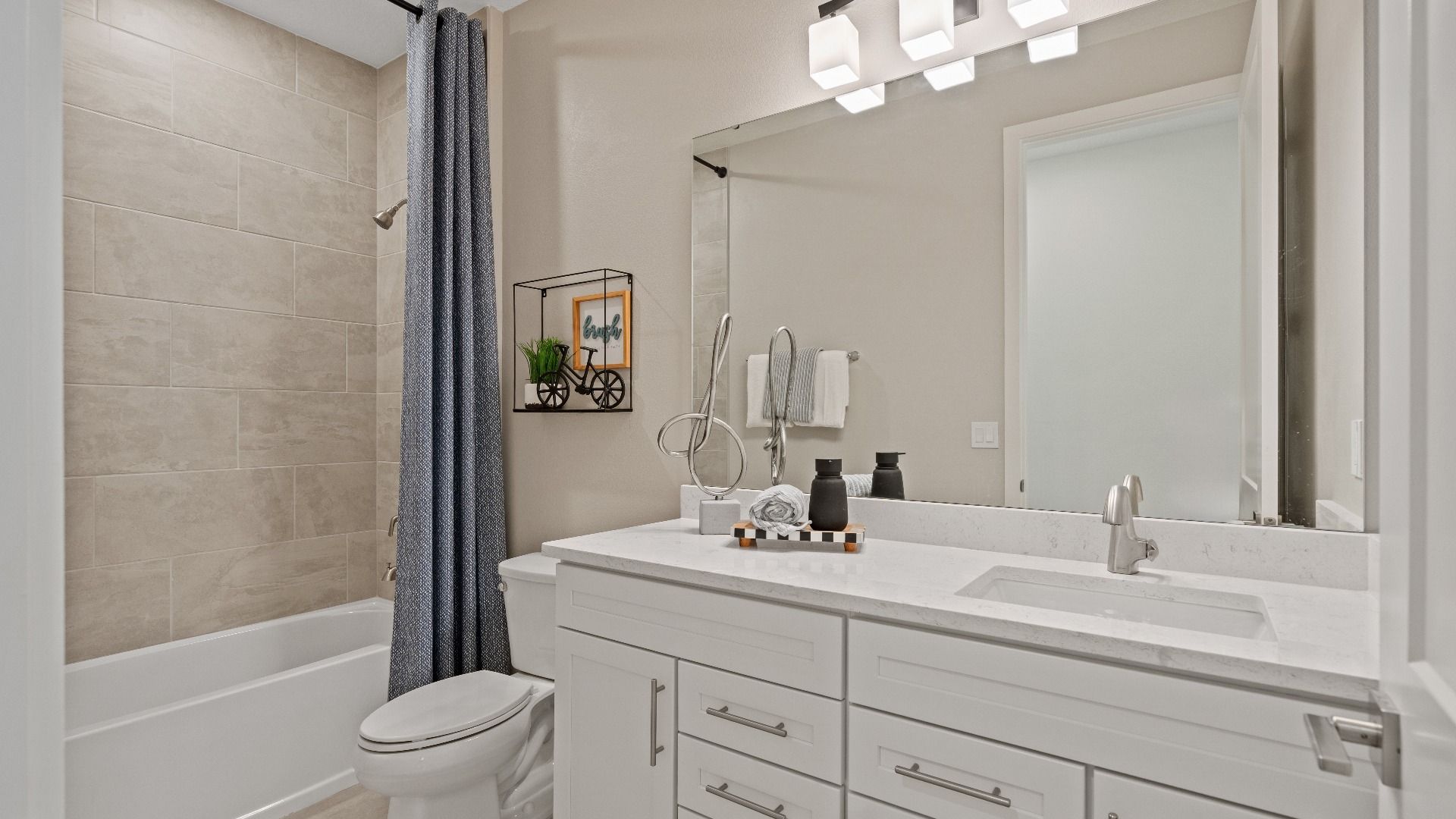 Secondary Bathroom in Ardisia Park Model Home Oleander Floor Plan by DRB Homes in New Smyrna Beach, FL