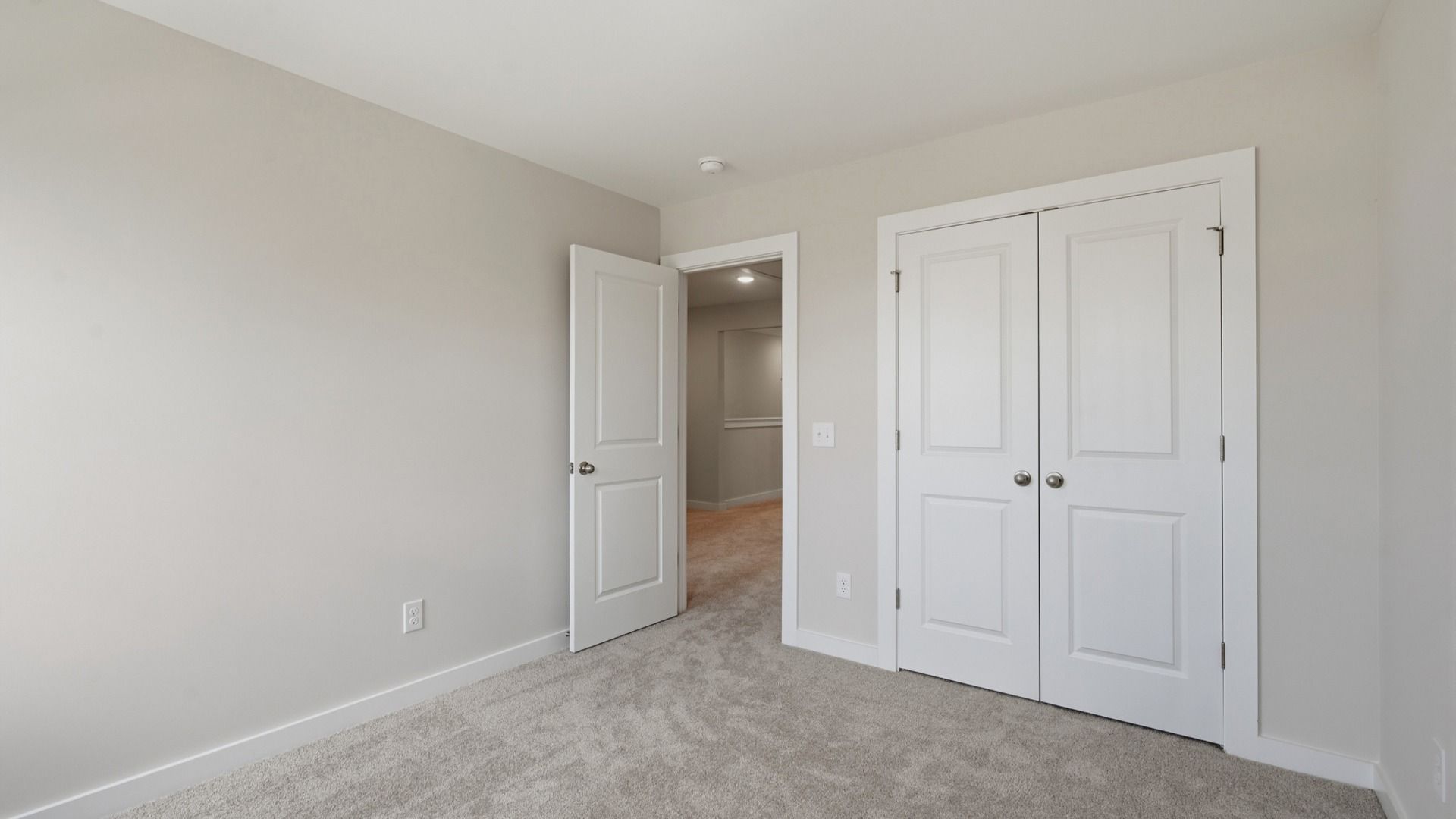 Secondary bedroom with convenient double closet doors