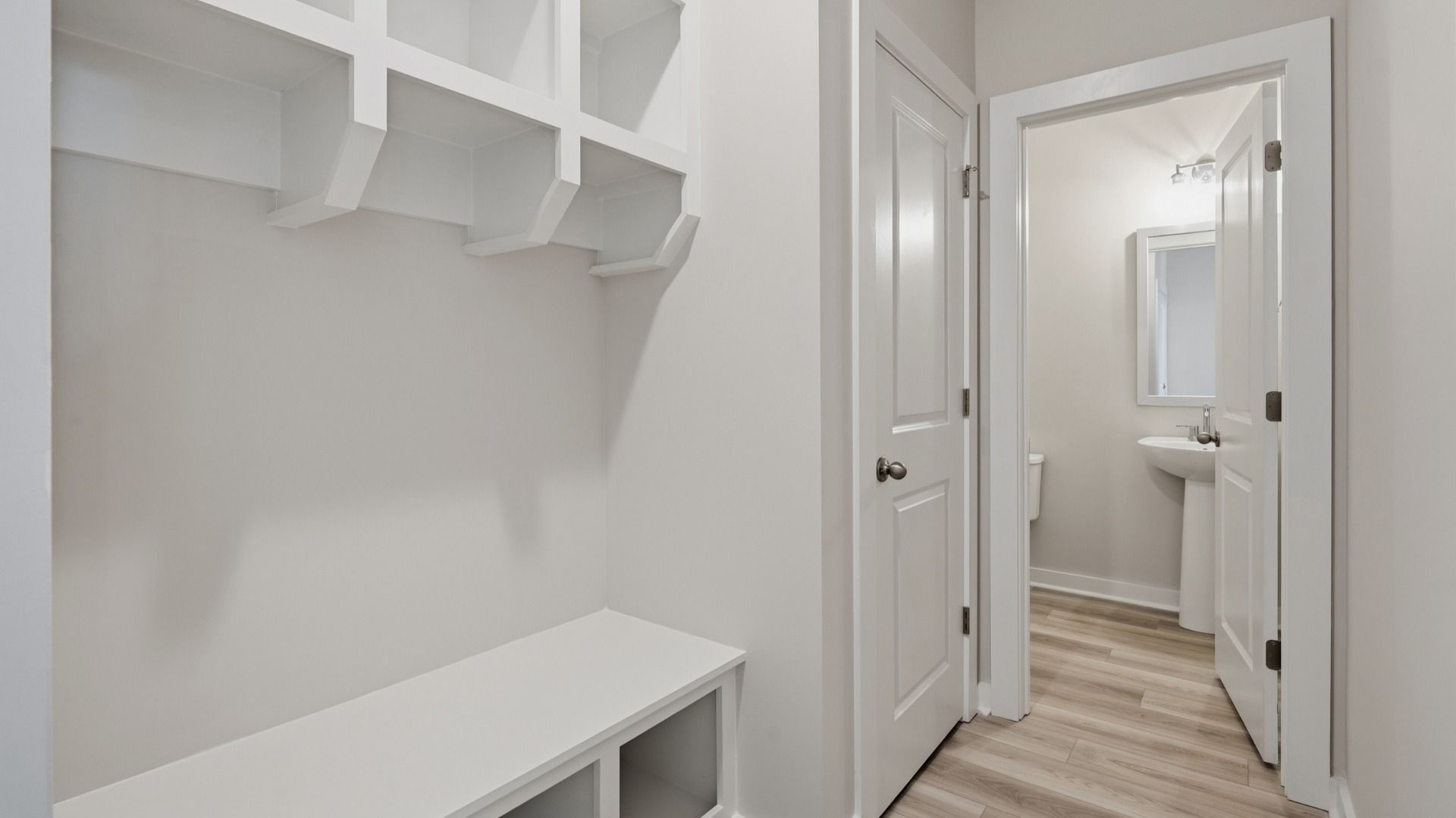Drop zone right off garage next to bathroom