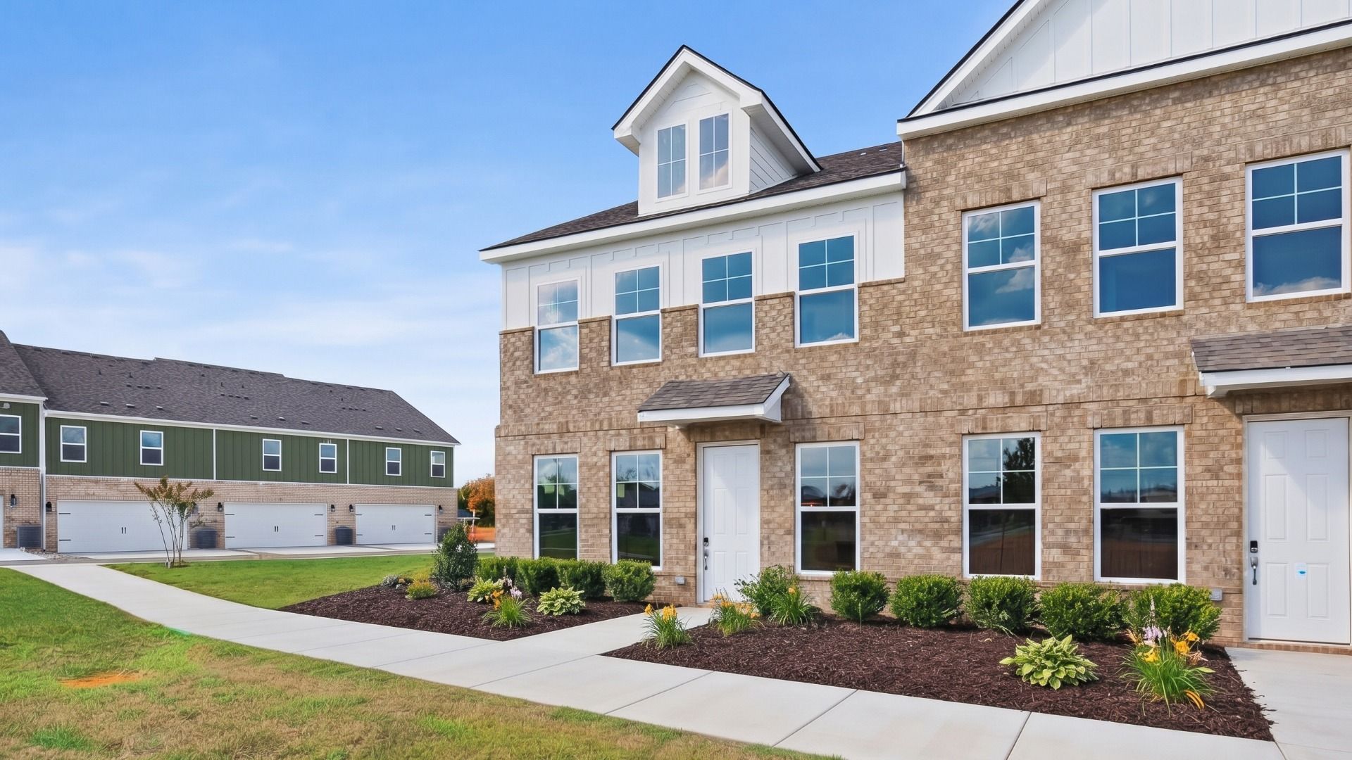 Enhanced Image of the second townhome building at Hartmann Landing, representative of a completed project