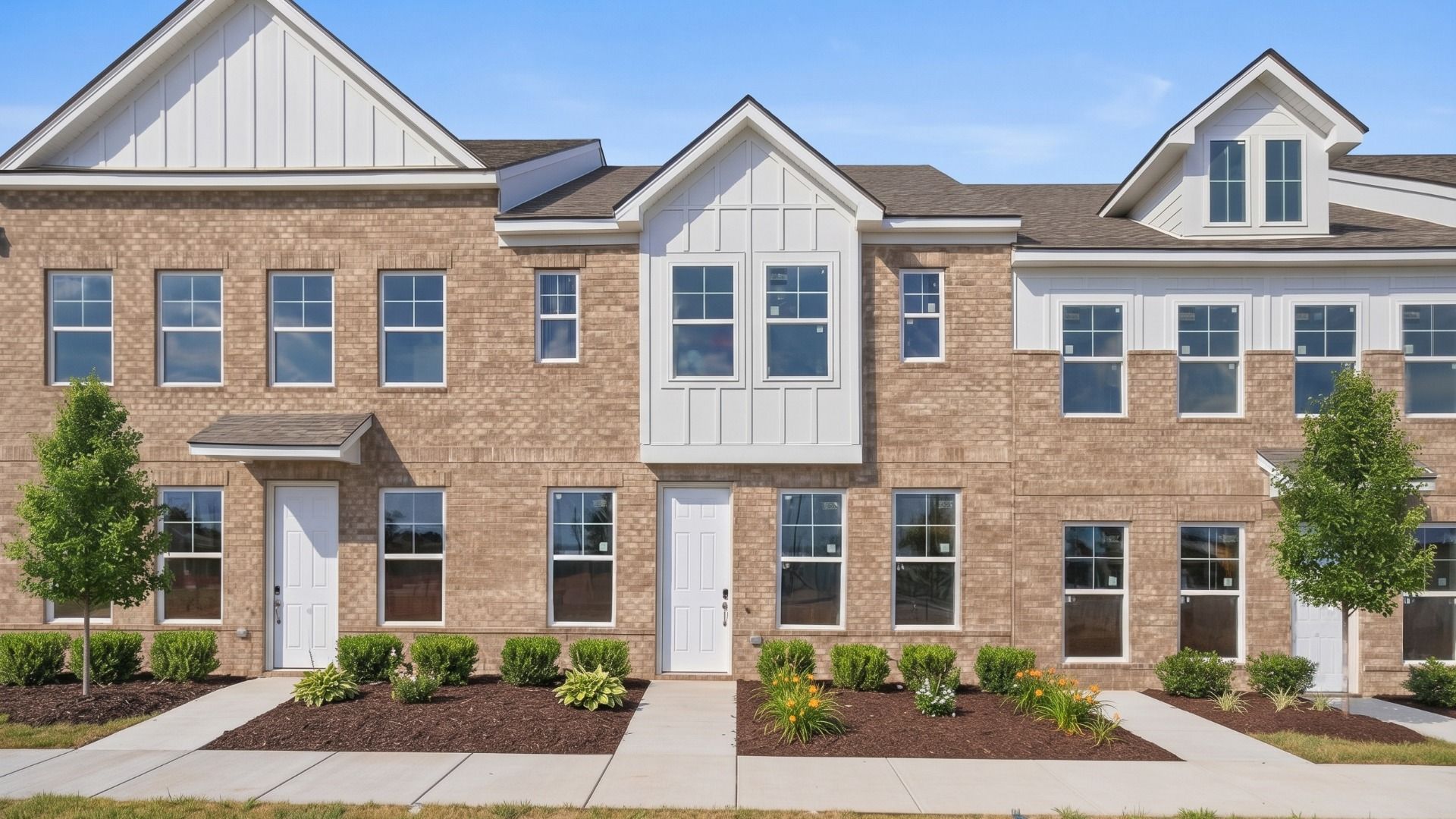 Enhanced Image of the second townhome building at Hartmann Landing, representative of a completed project