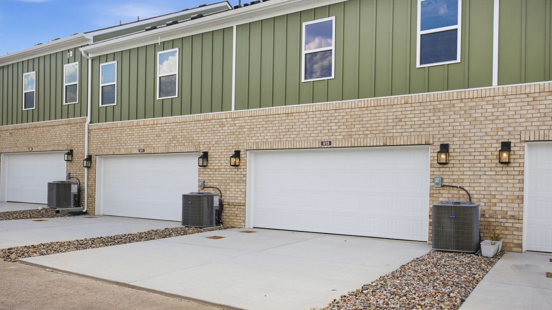 2-Car garages at the back of the home, offering tons of storage and parking space