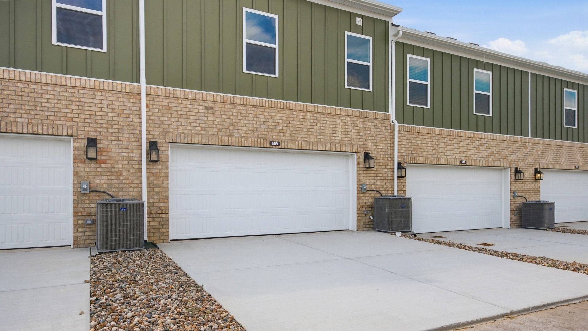 2-Car garages at the back of the home, offering tons of storage and parking space