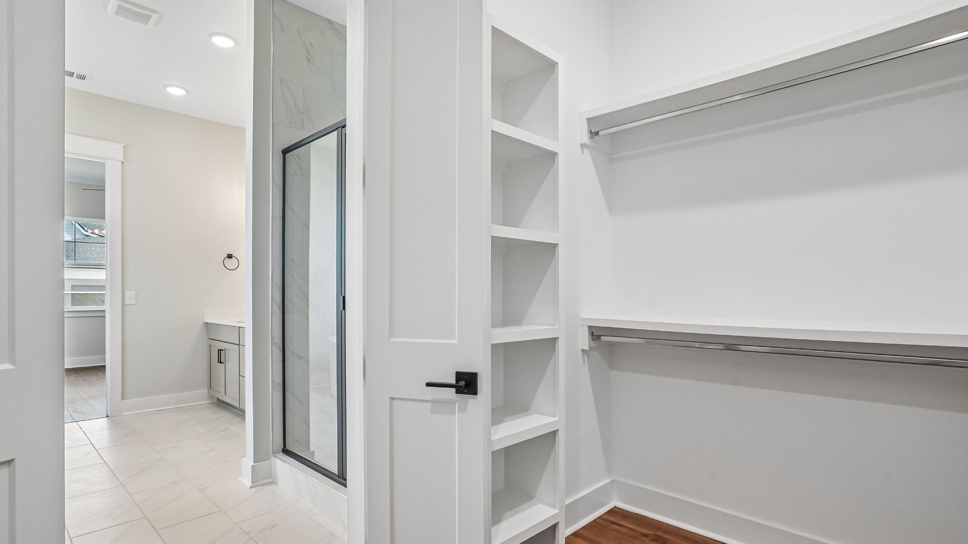 Spacious Walk-In Closet with Upgraded Built-In Shelving Standard!
