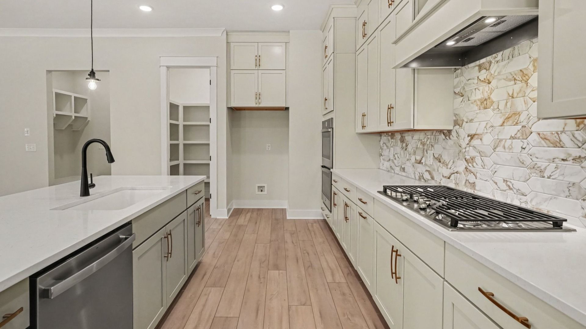 Walkin pantry next to drop zone leading into kitchen
