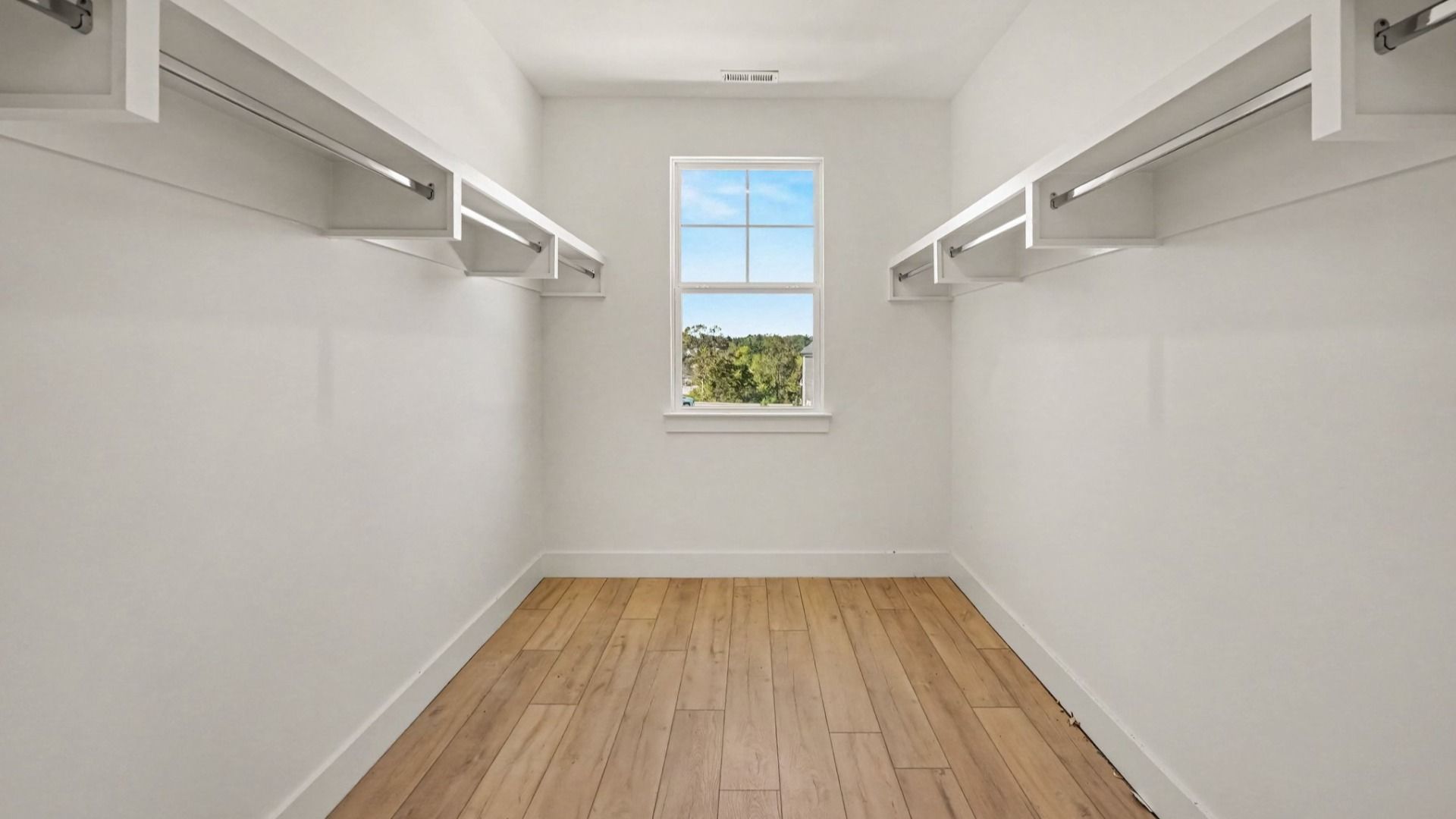 Elevated primary bedroom walk-in closet in the Solace II plan