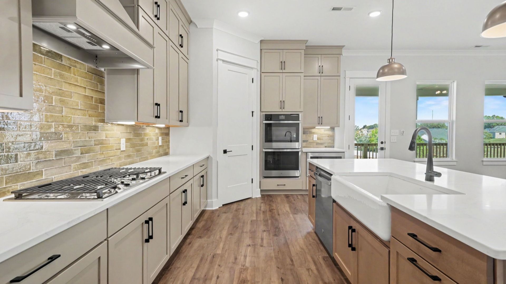 Overlook the main living area while cooking in this elevated kitchen