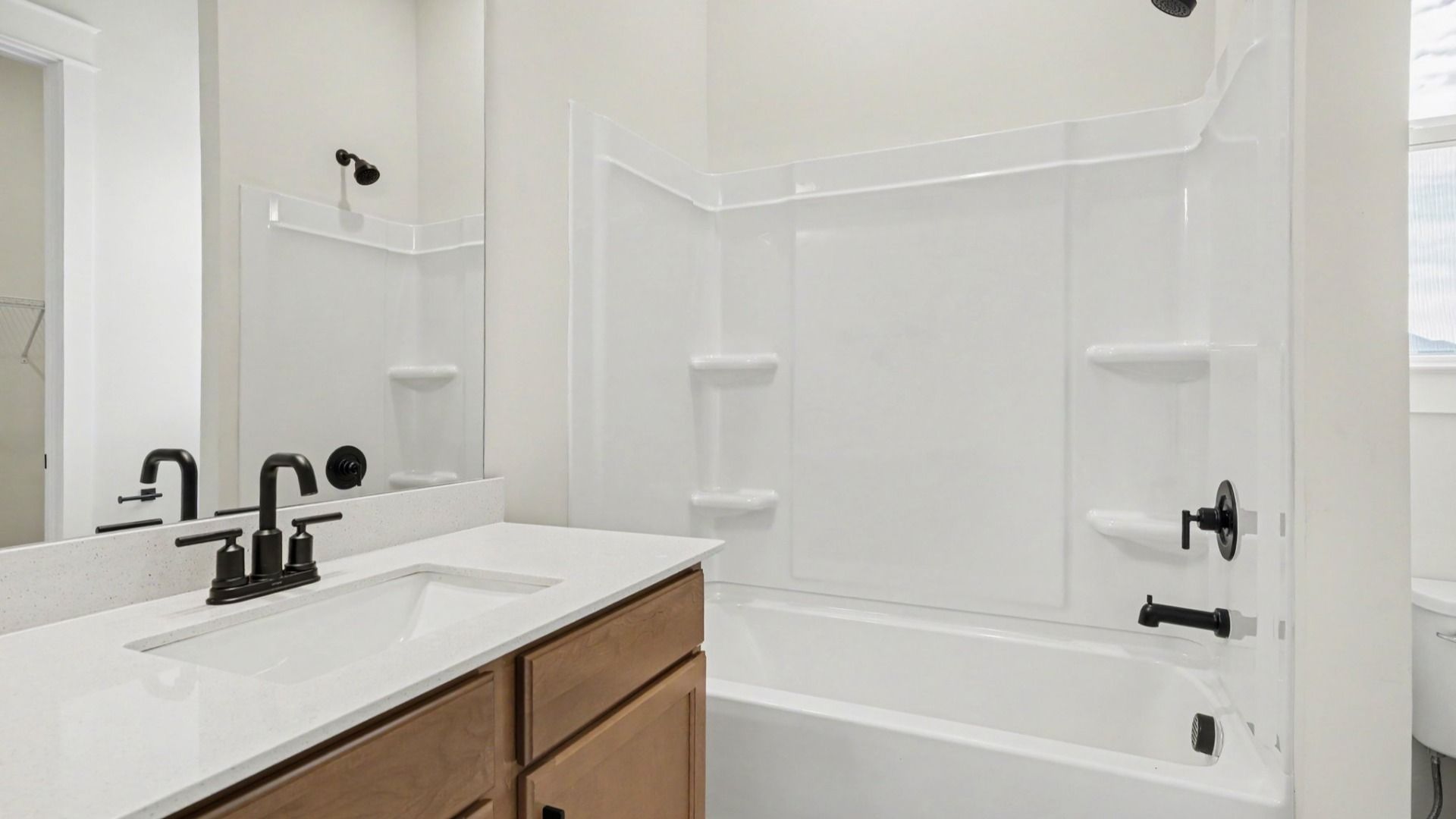 Bathroom with shower and bathtub