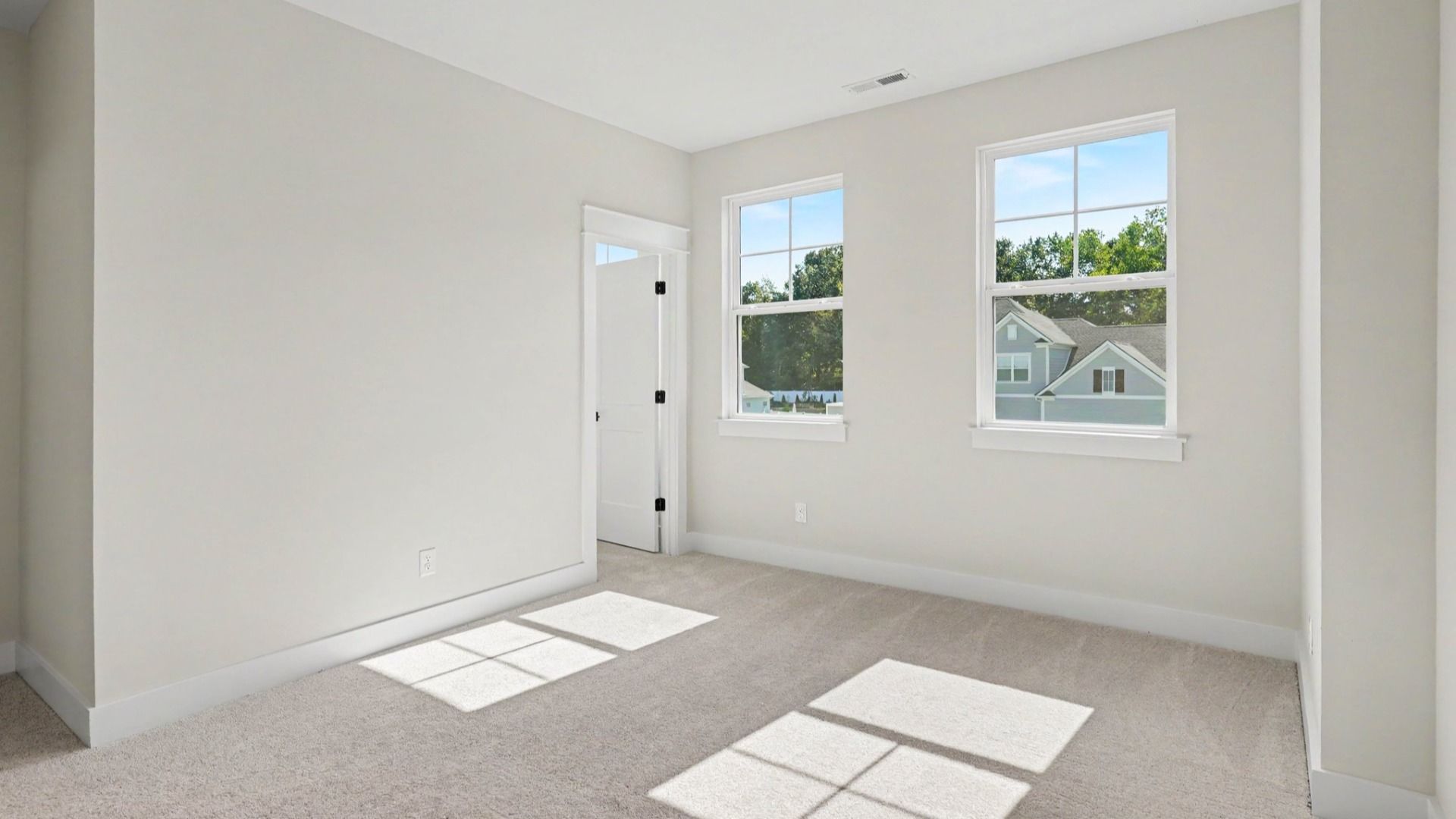 Secondary bedroom with walk-in closet