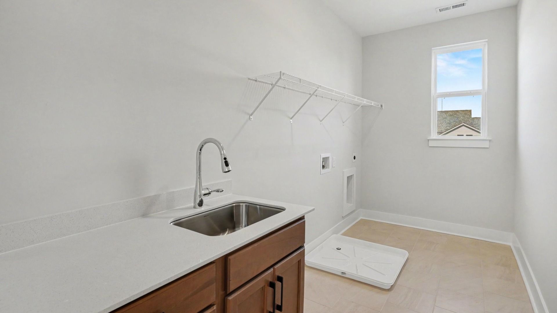 Convenient upstairs dedicated laundry room