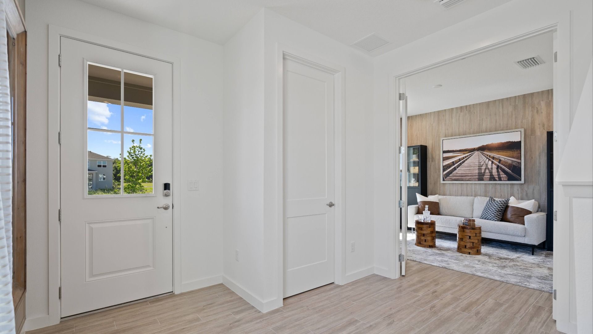 Entry and flex room/study in a DRB Home Clementine model at the Trinity Place community.