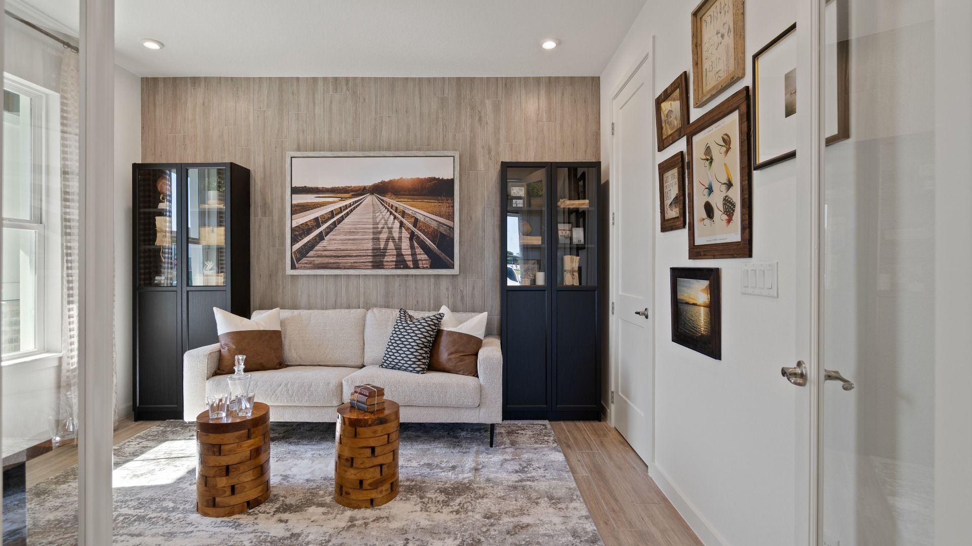 Front flex space/office with doors in a DRB Home Clementine model at the Trinity Place community.
