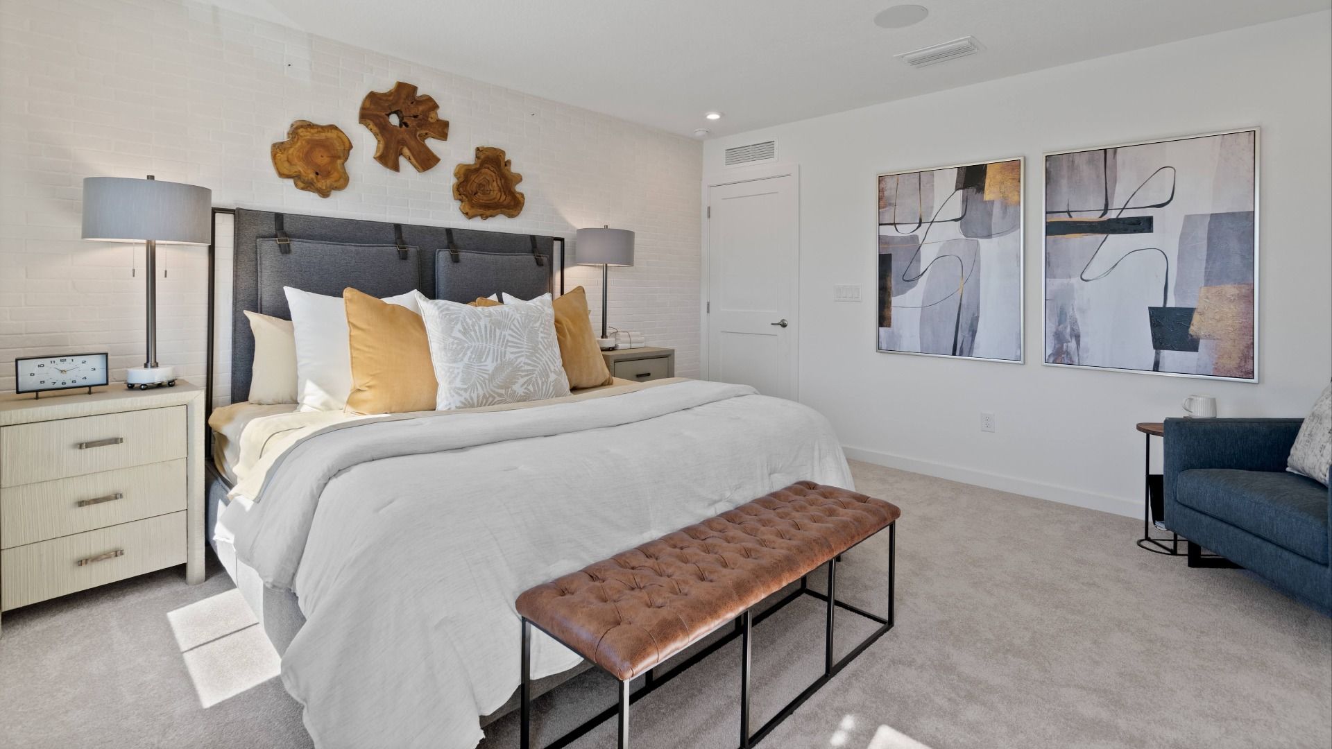 Spacious, carpeted primary suite in a DRB Home Clementine model at the Trinity Place community.