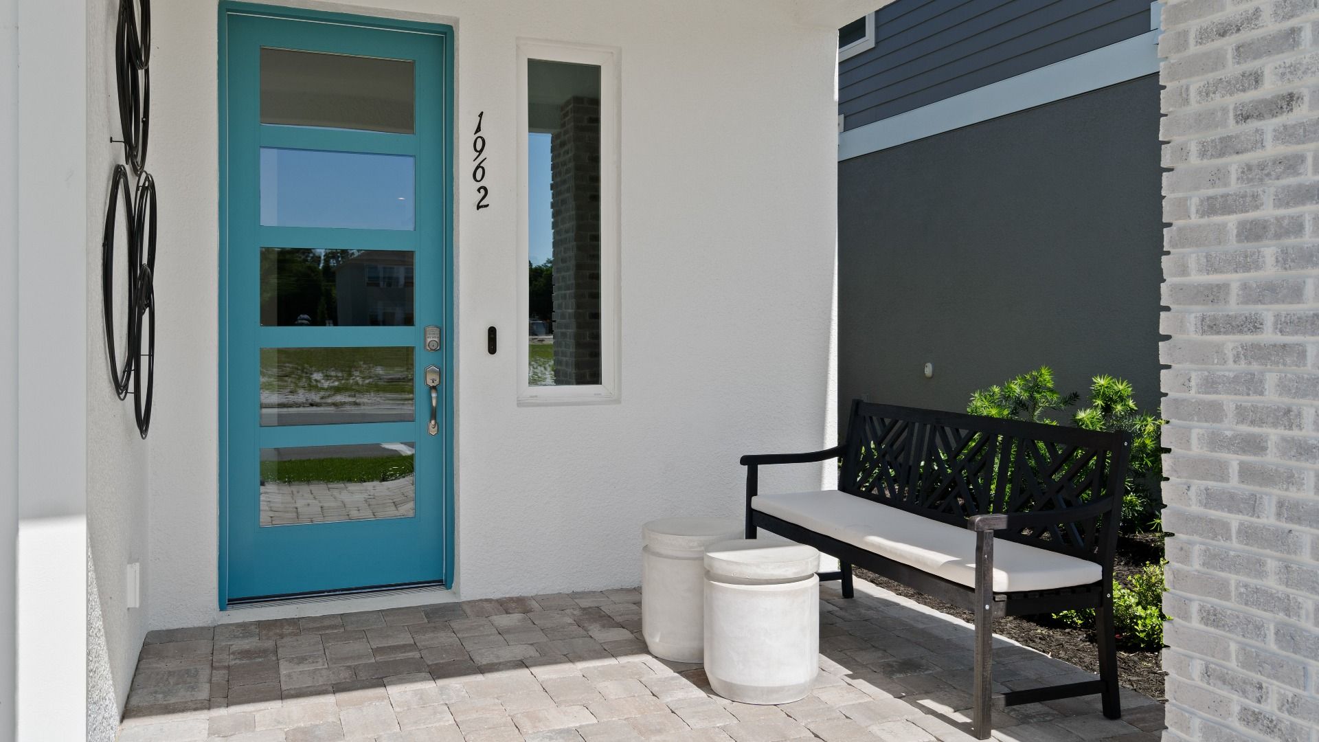 Outside covered entry at a DRB Homes Ambersweet model at the Trinity Place community.