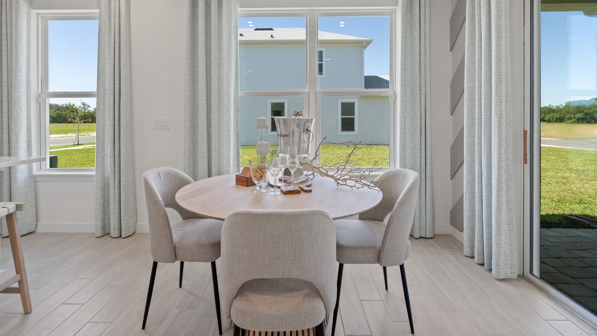 Breakfast area with large double window at a DRB Homes Ambersweet model at the Trinity Place community.