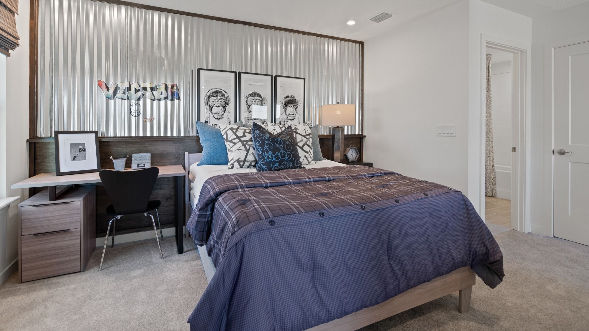 Above garage retreat space bedroom in a DRB Homes Ambersweet model at the Trinity Place community.