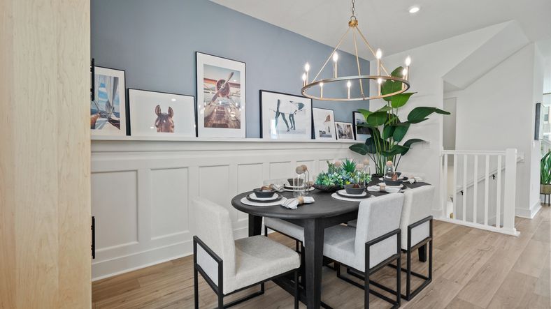 Open-concept kitchen and dining area—perfect for hosting and gathering with friends and family at DRB Parkview at Hamlin!