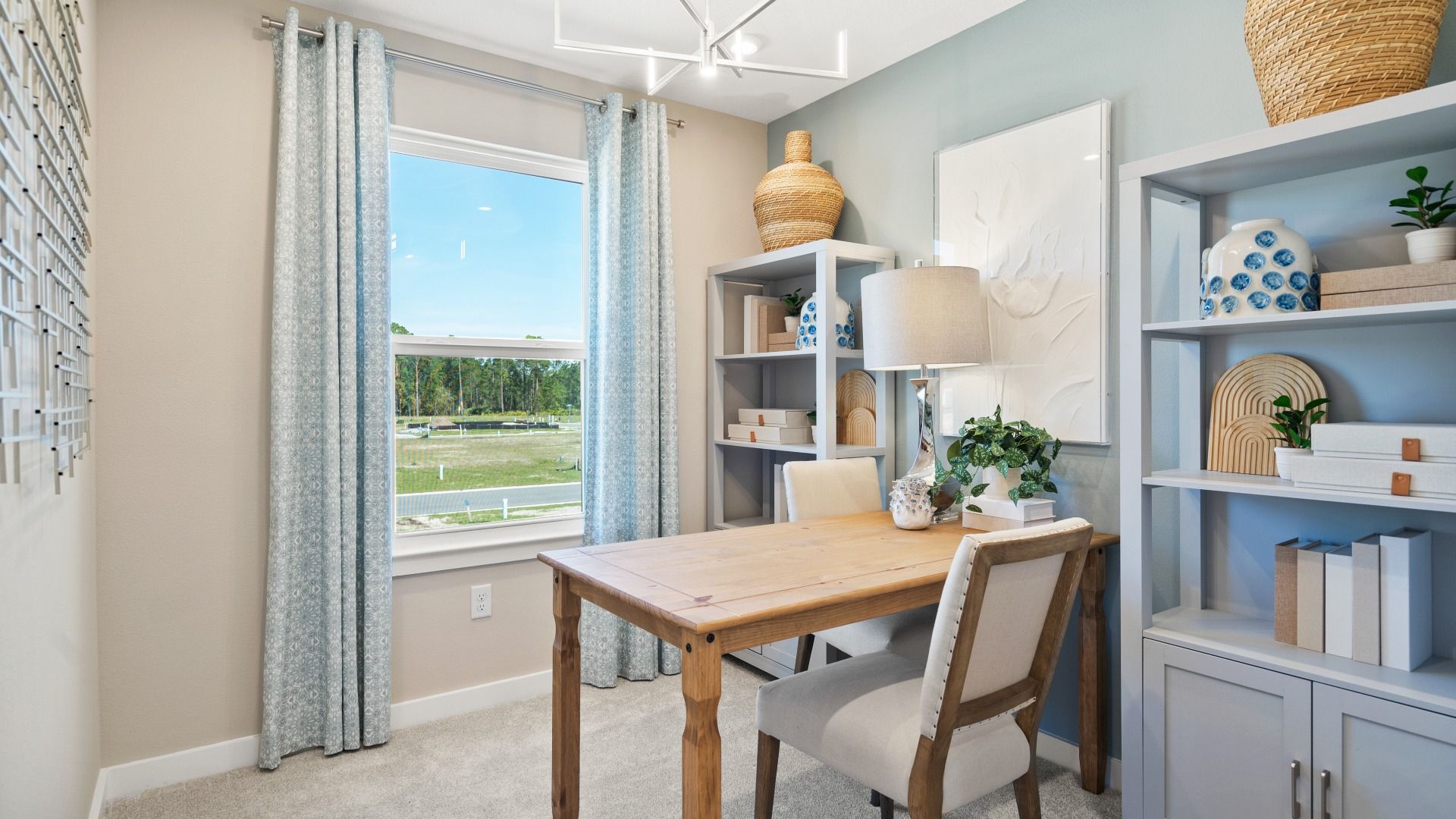 Cyrene at Harmony by DRB Homes offers a flex and den space—perfect for a home office or study, with plenty of room to focus