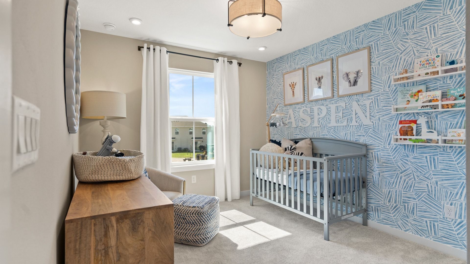 The third bedroom at Cyrene at Harmony by DRB Homes features ample natural lighting, creating a warm and inviting atmosphere.